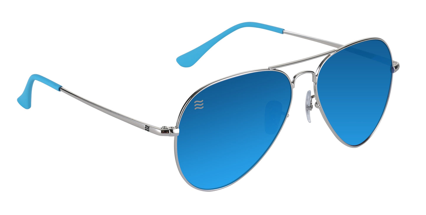 Neven Eyewear’s H2O sunglasses feature a classic aviator style with thin silver stainless steel frames, bright blue mirrored polarized lenses, matching blue plastic temple tips, adjustable clear nose pads, UV400 protection, and a small logo on the left lens.