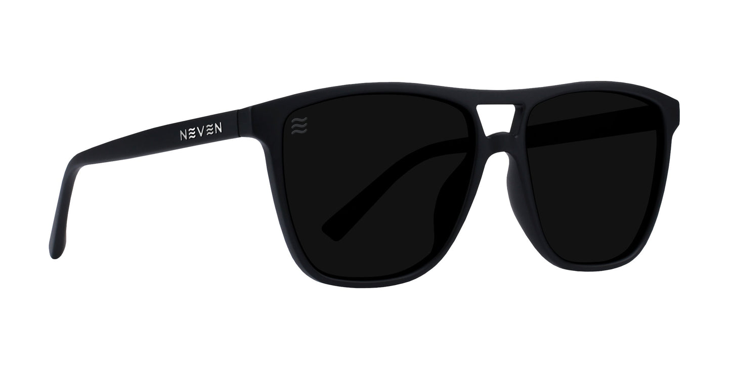 The Abyss by Neven Eyewear are all-black polarized UV400 sunglasses with a matte rectangular frame and a subtle bridge break. The left temple displays the NEVEN logo in white, set against a plain white background.