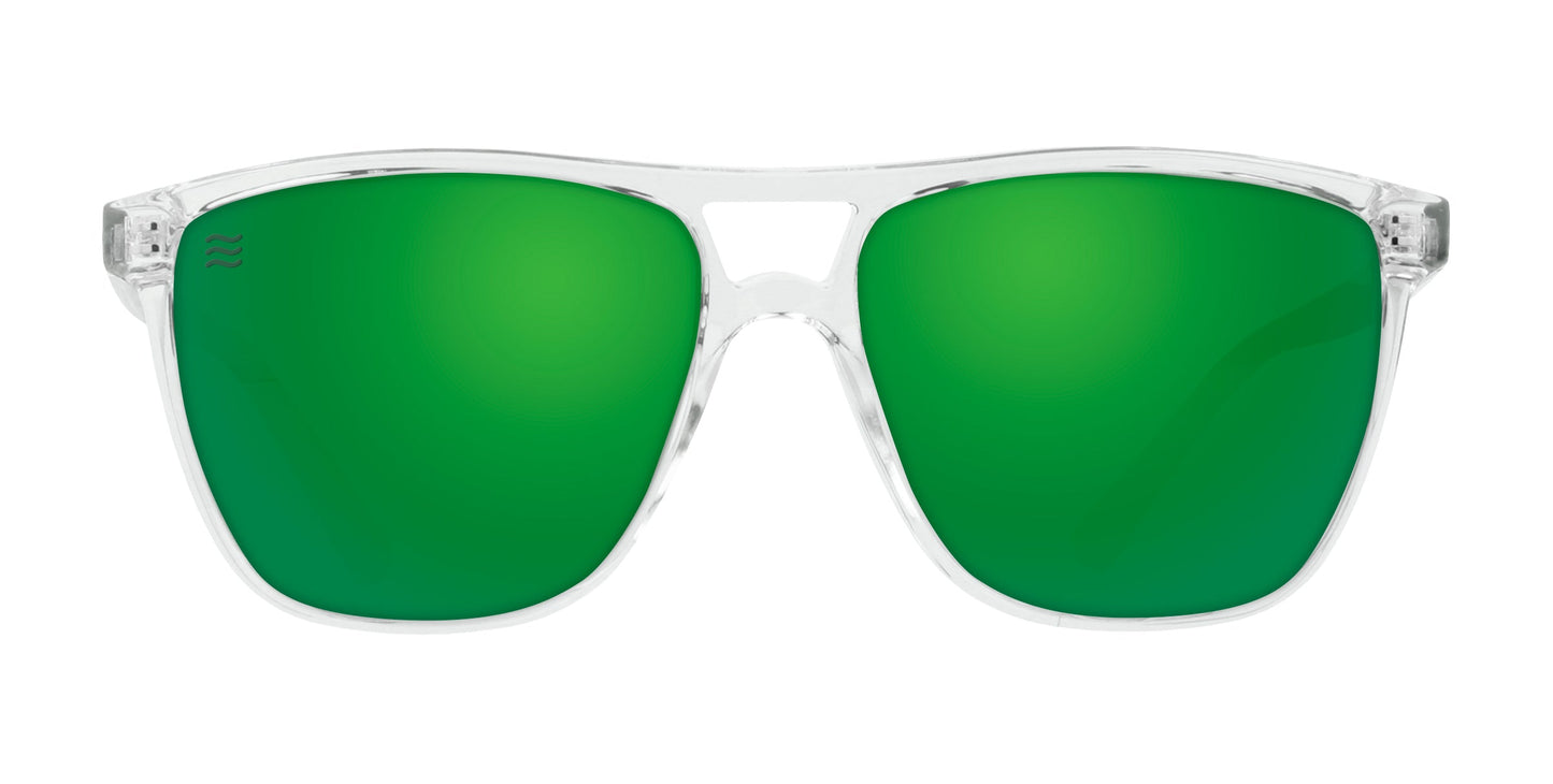 The Hangar's by Neven Eyewear are clear plastic sunglasses with large emerald green lenses, a unique bridge, curved edges, and polarized UV400 protection. Sleek and sporty with no logos or embellishments; shown on a white background.