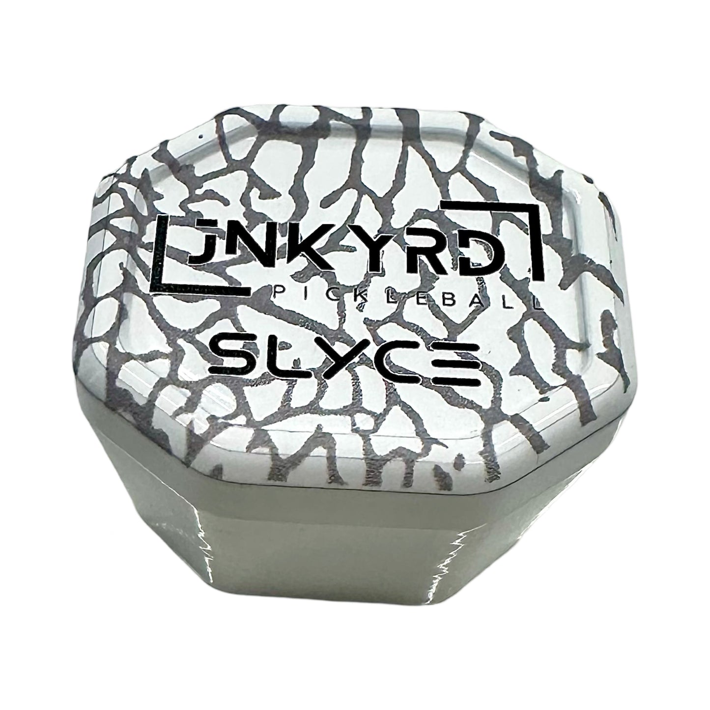 The Special Edition Junkyard Pickleball SpeedCap (28g, 1.0 oz.) by Slyce Sport is an octagonal white container with a black crackle lid, ideal for storing your replacement grip or paddle grip cap.