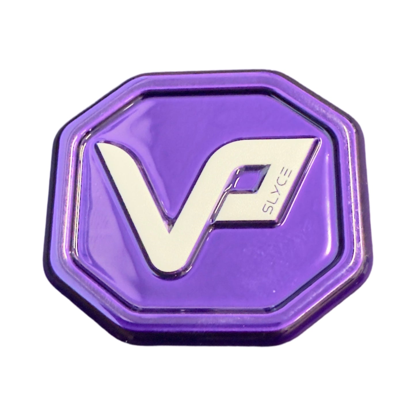 The Special Edition Vatic Pro SpeedCap (28g, 1.0 oz.) Paddle Performance Enhancer by Slyce Sport is a shiny, purple, octagonal cap with a raised silver V and P logo and the word "SLYCE" on the glossy surface's upper right.