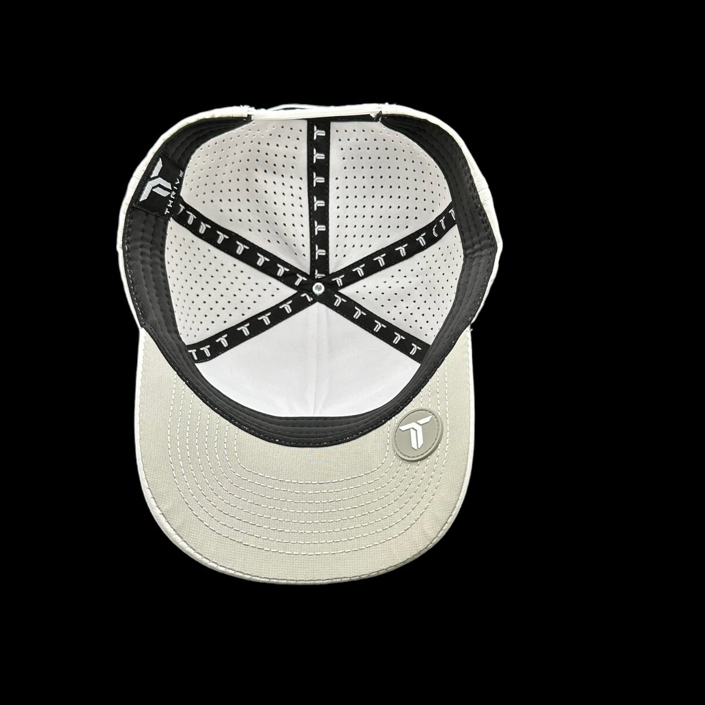 The Thrive Pickleball Elite Tour Hat is a white luxury hat with black straps, combining premium style and performance headwear for a standout look.