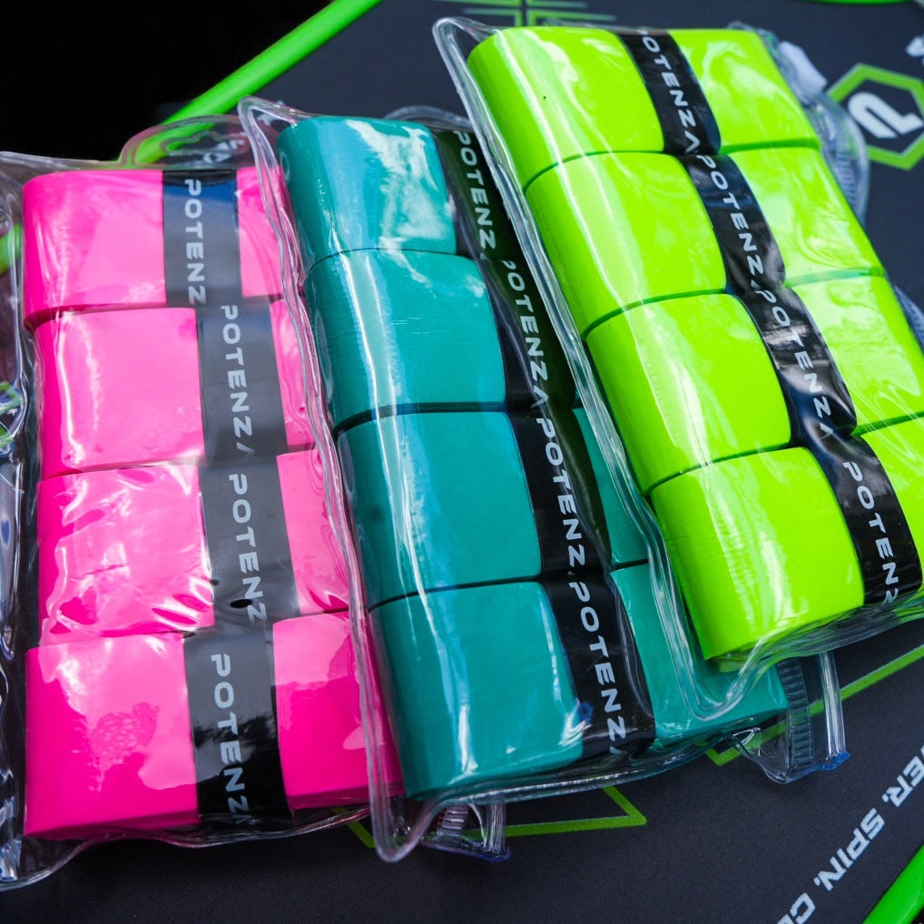 Four packs of Potenza Pickleball PROX Tacky Overgrip in neon pink, teal, and neon yellow are shown, each containing four moisture-wicking grips wrapped in clear plastic and secured with black “POTENZ” bands.
