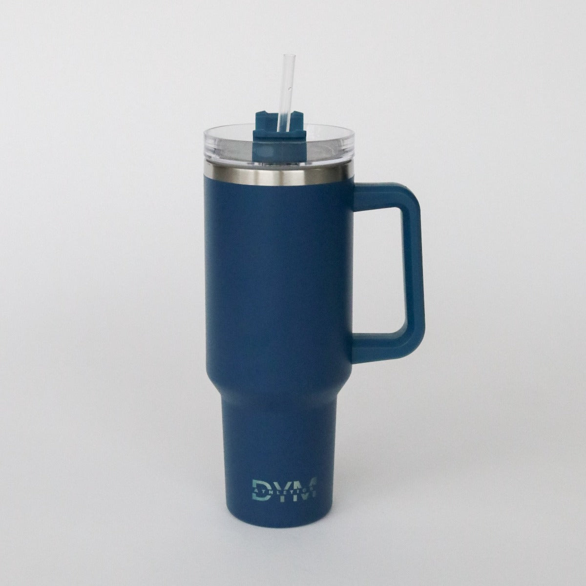 The D.Y.M 40oz Tumbler by DYM Athletics is a tall blue insulated mug with an ergonomic handle, clear lid, blue straw, metallic rim, and “DYM” in silver near the base. It’s BPA free and shown against a plain white background.
