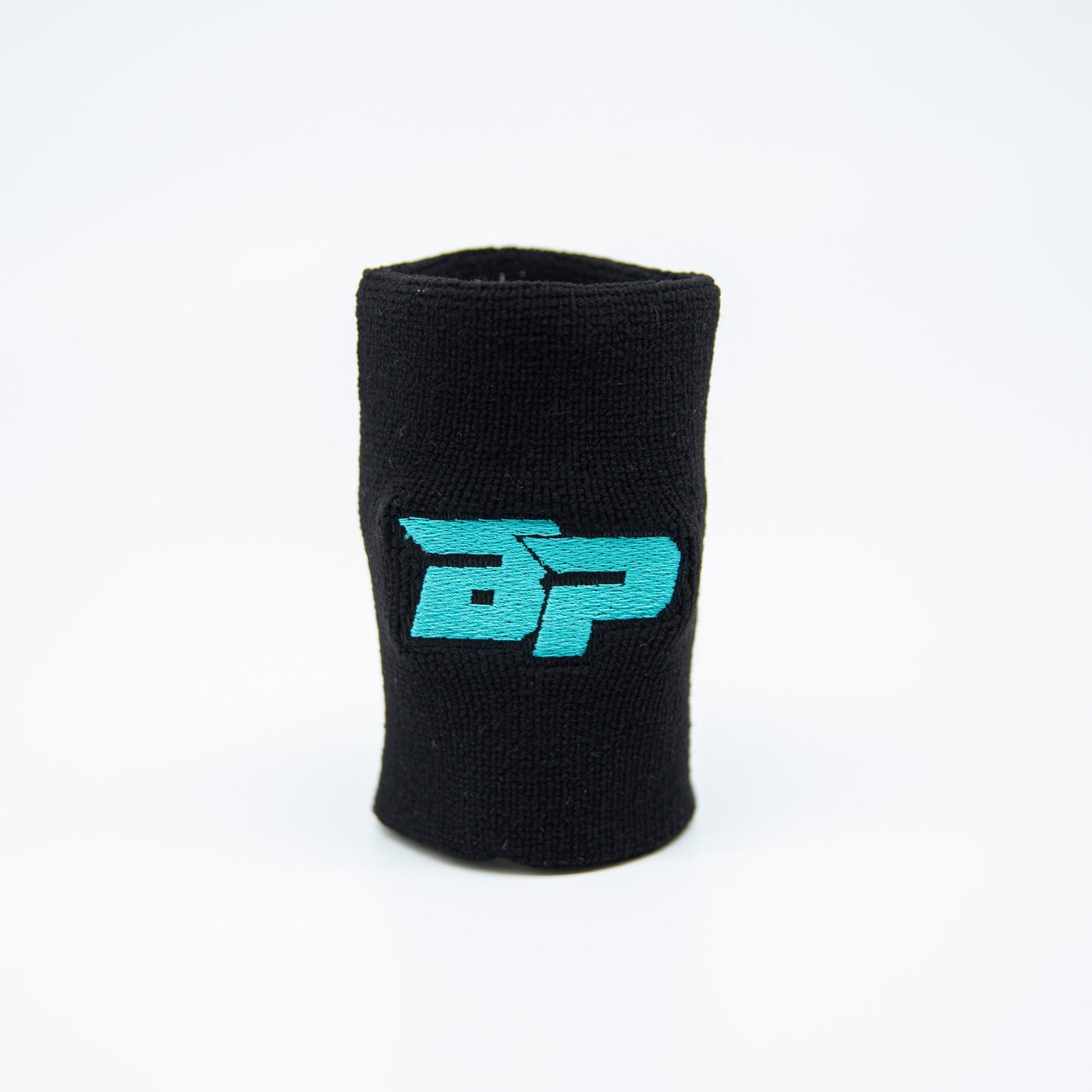 A black Bodhi Performance Wristband (1pc) stands upright on a white background, featuring a blue embroidered BP logo at the center. The sweat-wicking fabric’s texture is visible against the clean, minimal backdrop.