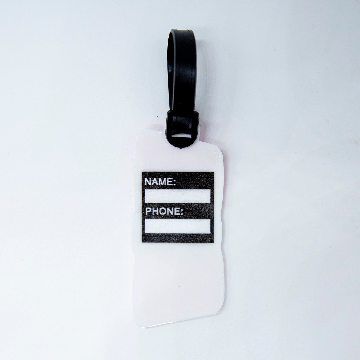 The Bodhi Bag Tags by Bodhi Performance are white and black luggage tags, ideal as pickleball bag tags or stylish tournament bag tags.