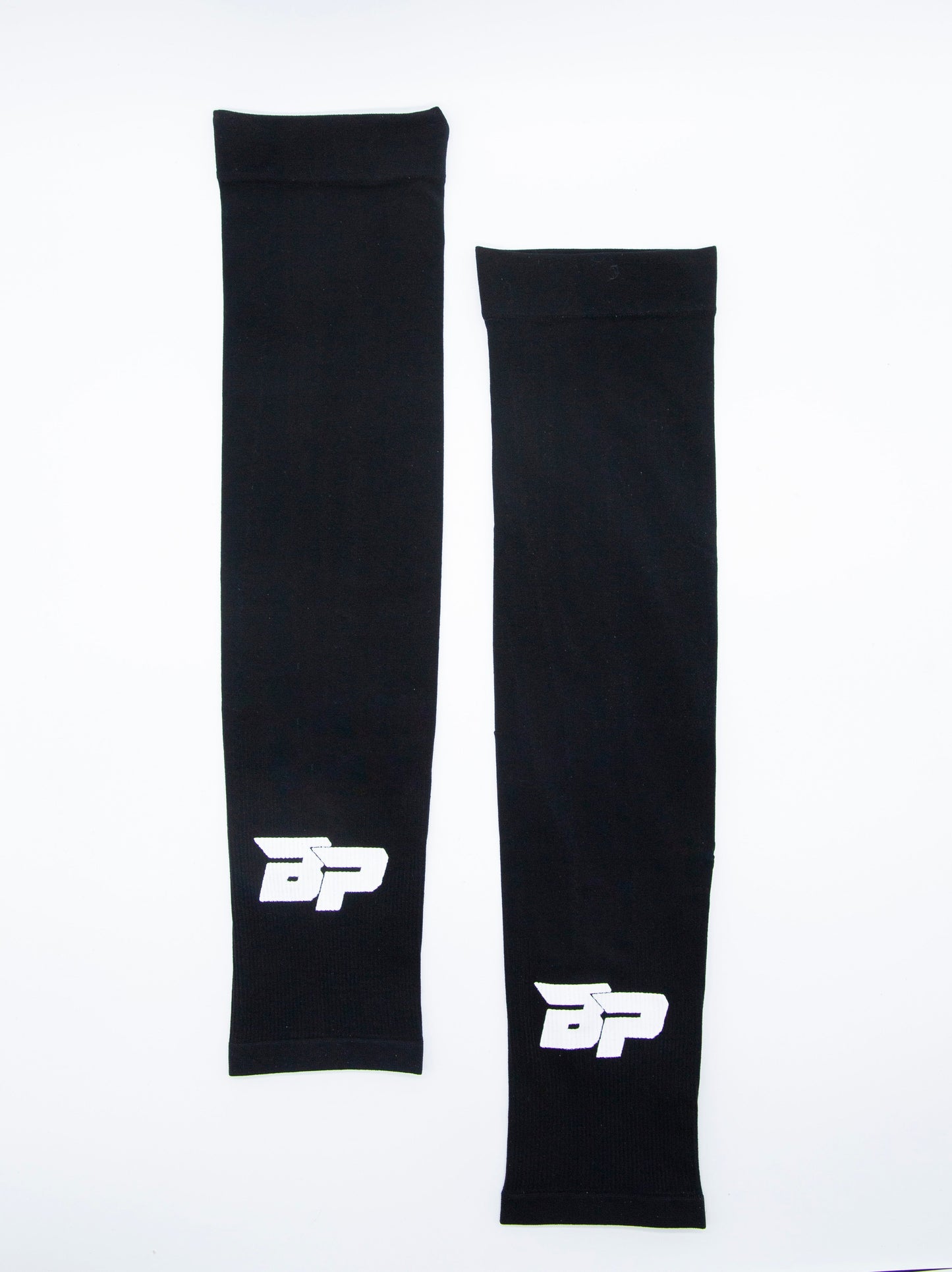 A pair of black socks with white letters, made by Bodhi Performance, designed to match your Performance Arm Sleeves and keep you comfortable during any activity.