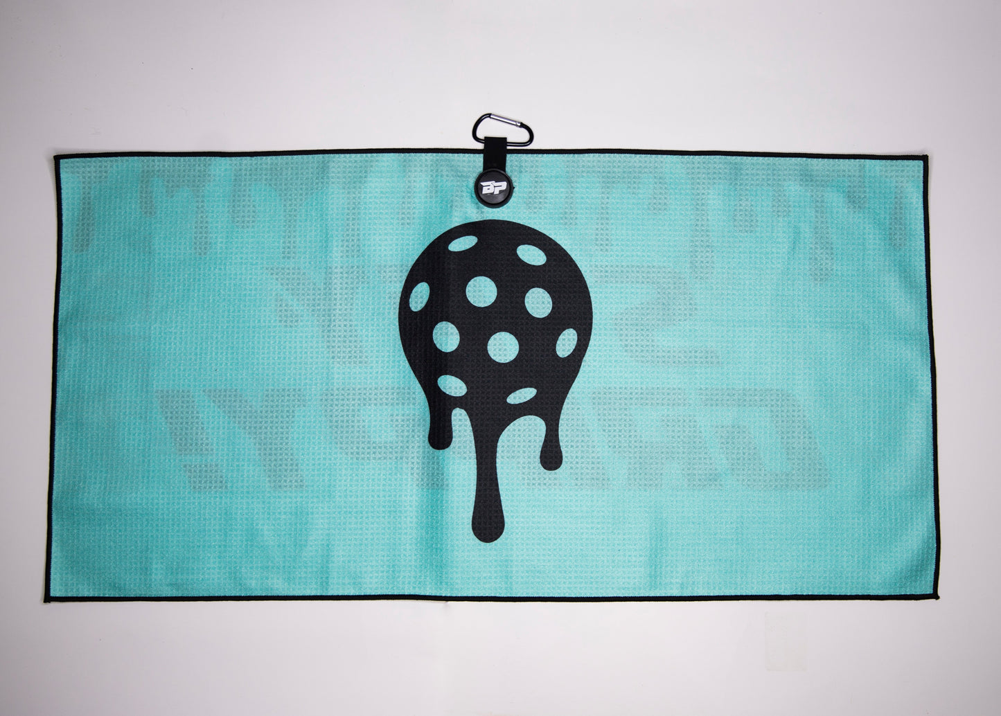 The Bodhi Performance Pickleball Towel features a sleek blue and black design—an essential microfiber towel and must-have accessory for pickleball players.