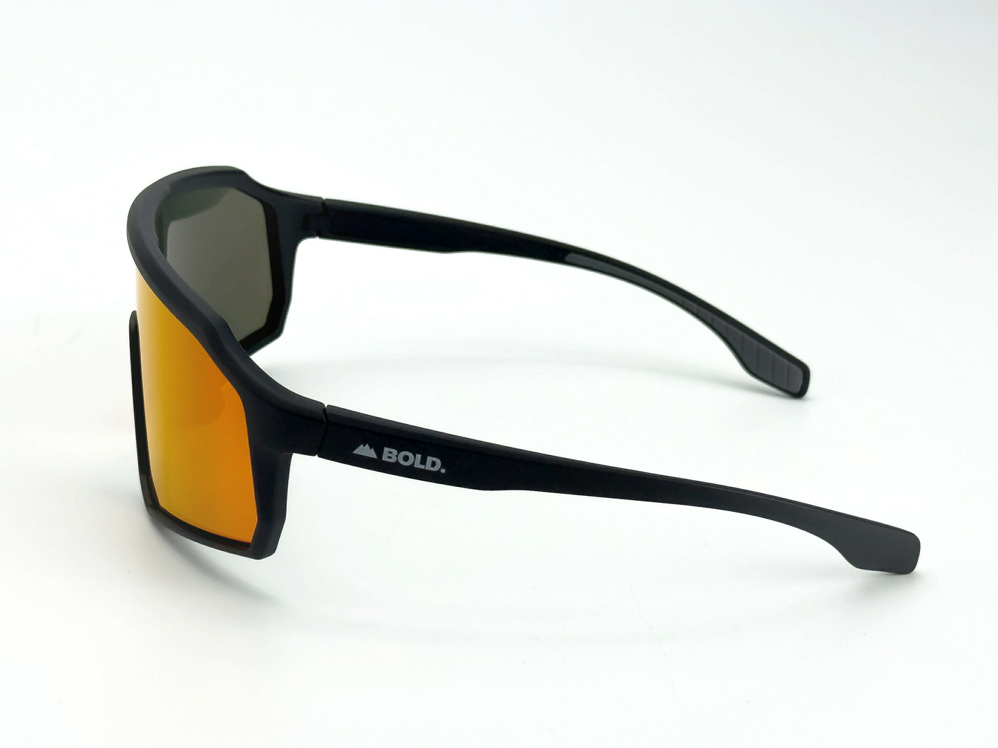 BOLD Rippers Kids Sunglasses by boldouterwear feature matte black, thick rectangular frames, orange mirrored UV400 lenses, and white BOLD. branding on the arms. Displayed angled on a plain white background to show one lens and both arms.