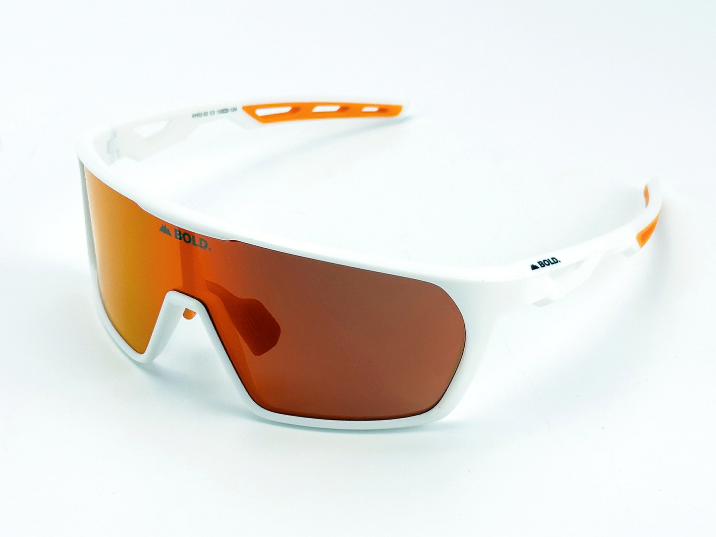 BOLD Senders Kids Sunglasses by boldouterwear feature a sleek white wraparound frame with orange accents, a single large orange-tinted lens, and UV400 protection—ideal MTB, ski & lifestyle eyewear. Brand name visible on the frame against a plain background.