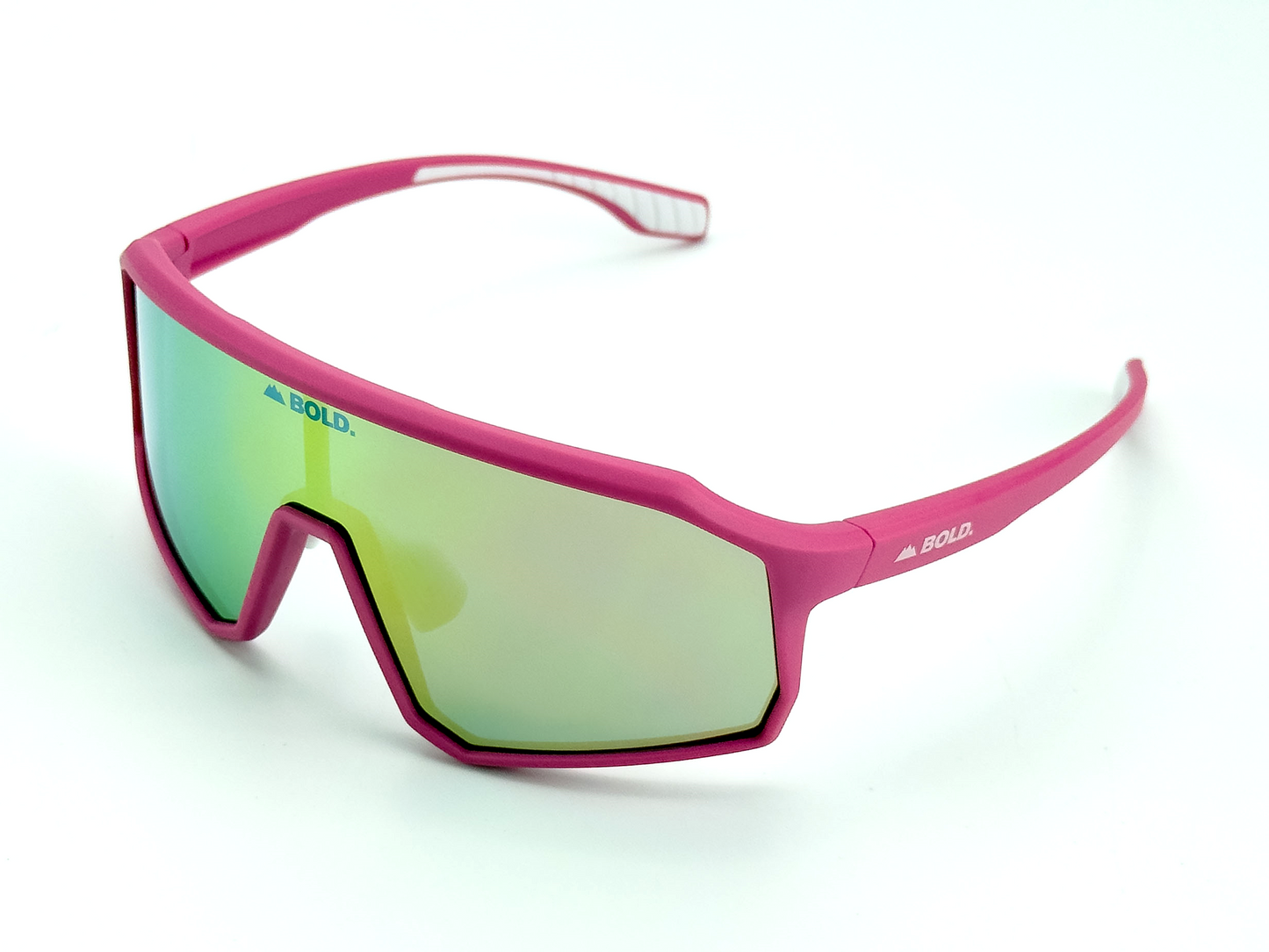 BOLD Rippers Kids Sunglasses by boldouterwear feature a bright pink frame, large reflective green lens, and white brand print on lens and temple. Curved temples with white detailing make them perfect for sporty kids’ MTB, ski, and lifestyle adventures.