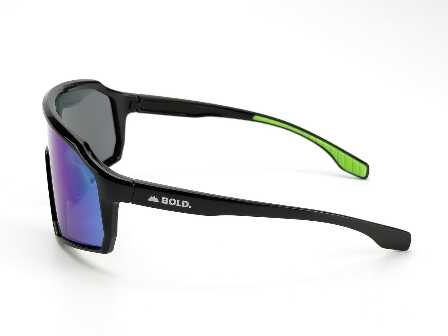 BOLD Rippers Kids Sunglasses by boldouterwear feature UV400 reflective purple-blue lenses, durable design, green inner tips, and "BOLD." beside a mountain icon. Displayed on a white background, angled left.