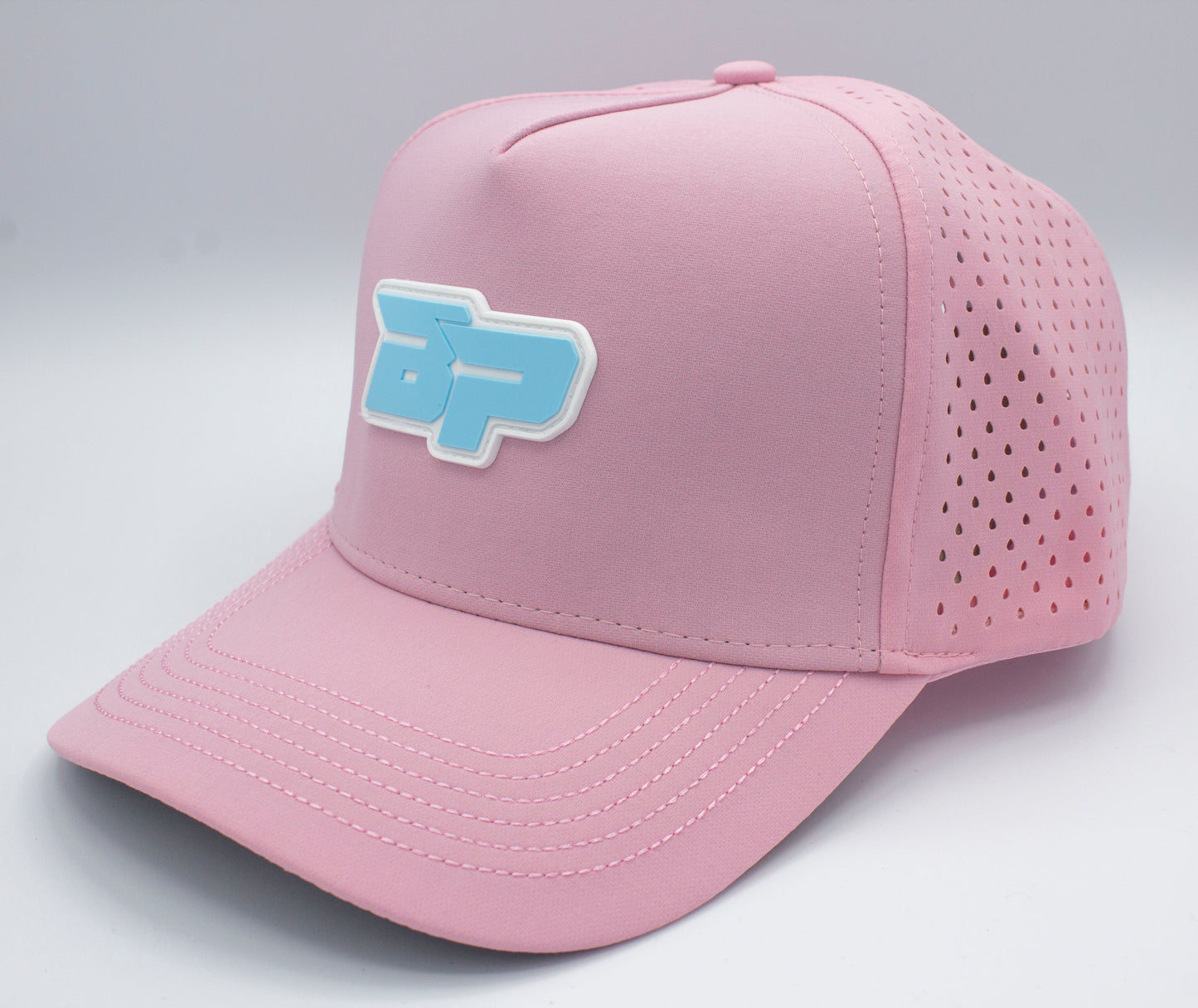 The Bodhi Performance ICON Snapback is a pink pickleball hat with a stylish logo, ideal for casual wear or games.