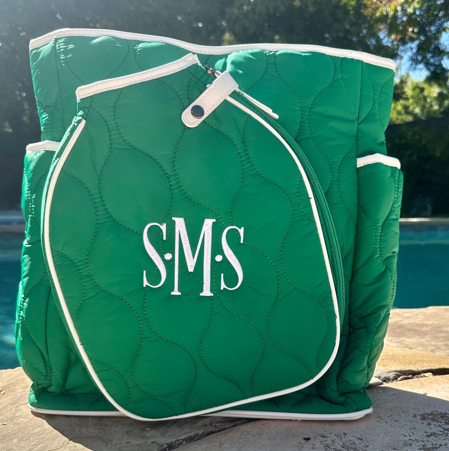The Queen of the Court Fifth Ave Pickleball Convertible Tote Bag/Backpack features a green design with white text, perfect for pickleball enthusiasts.