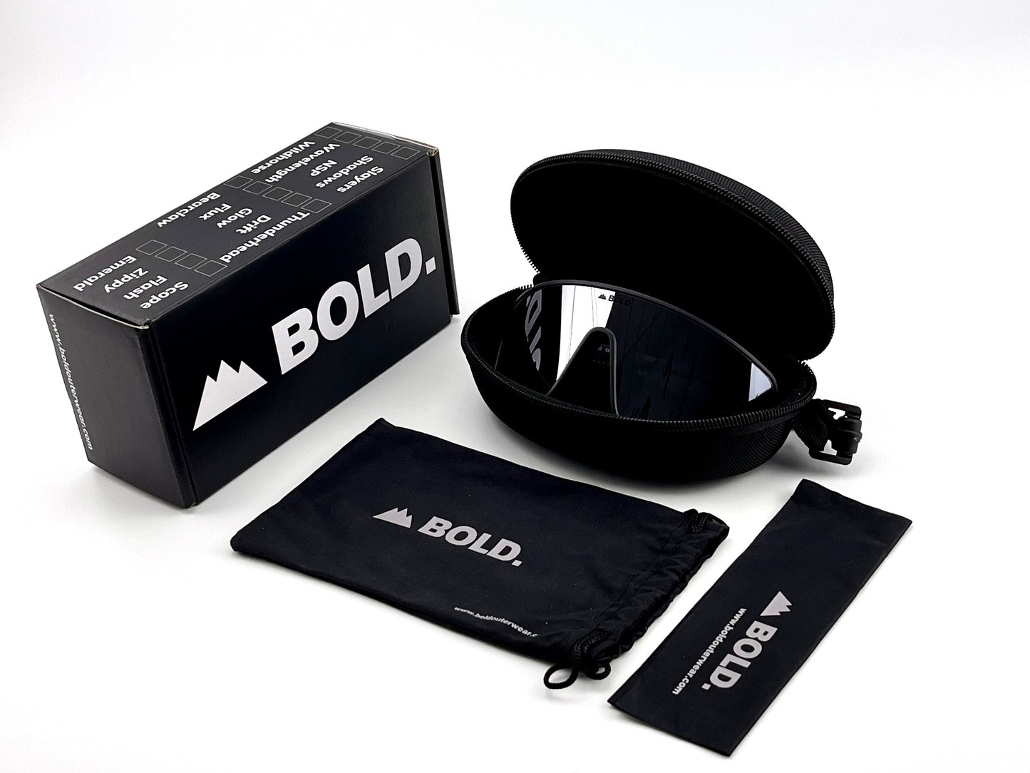 The BOLD NSP Performance Sunglasses from boldouterwear are shown with a black zippered case, box, drawstring pouch, and cleaning cloth—each branded—neatly arranged on a white background.