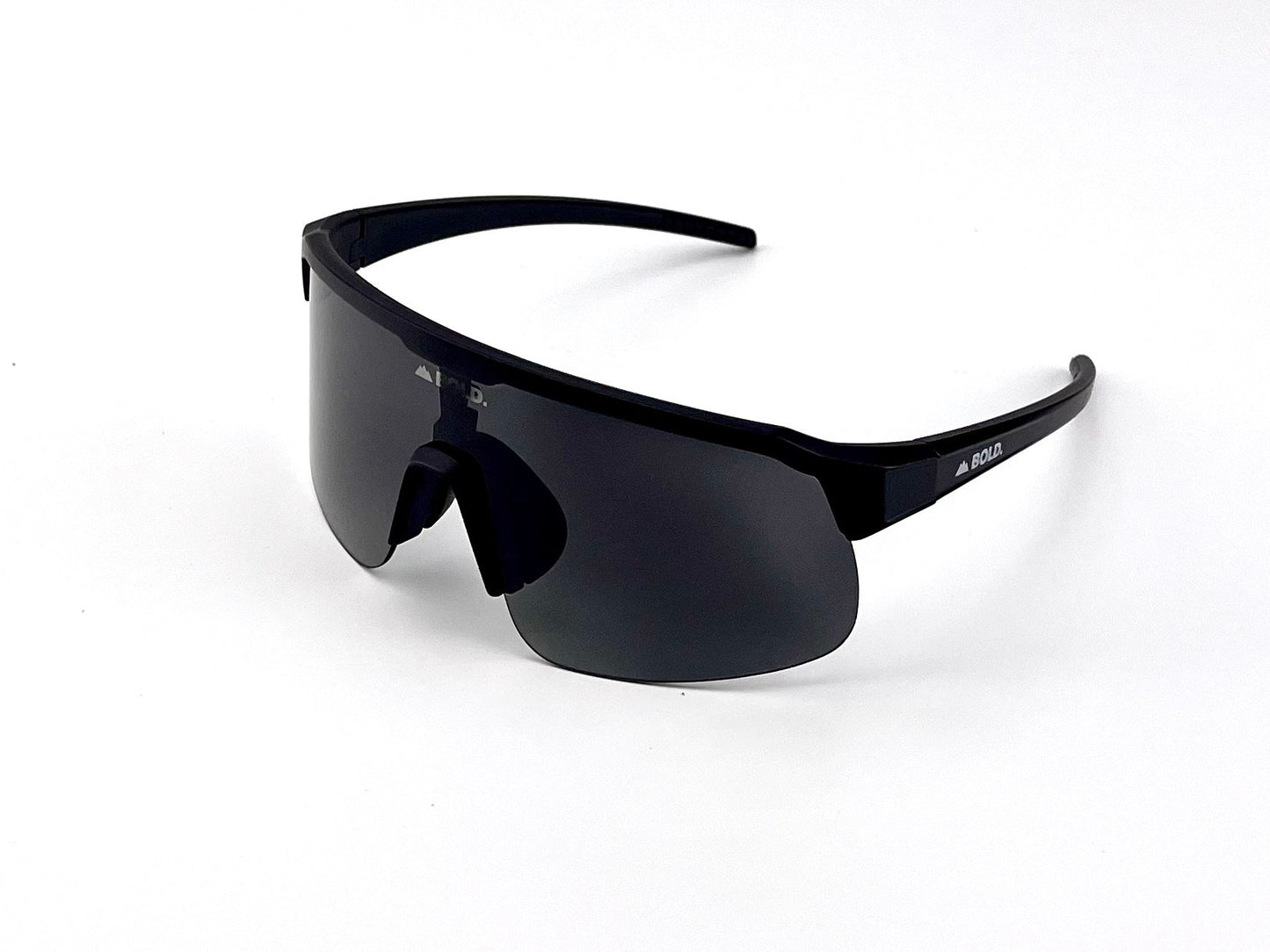 The BOLD Zippy Photochromic Sunglasses by boldouterwear feature a sleek wraparound design with a single dark lens, no lower frame, thick curved arms, black nose pads attached to the lens, and a lightweight build—perfect for MTB, ski, or everyday wear.