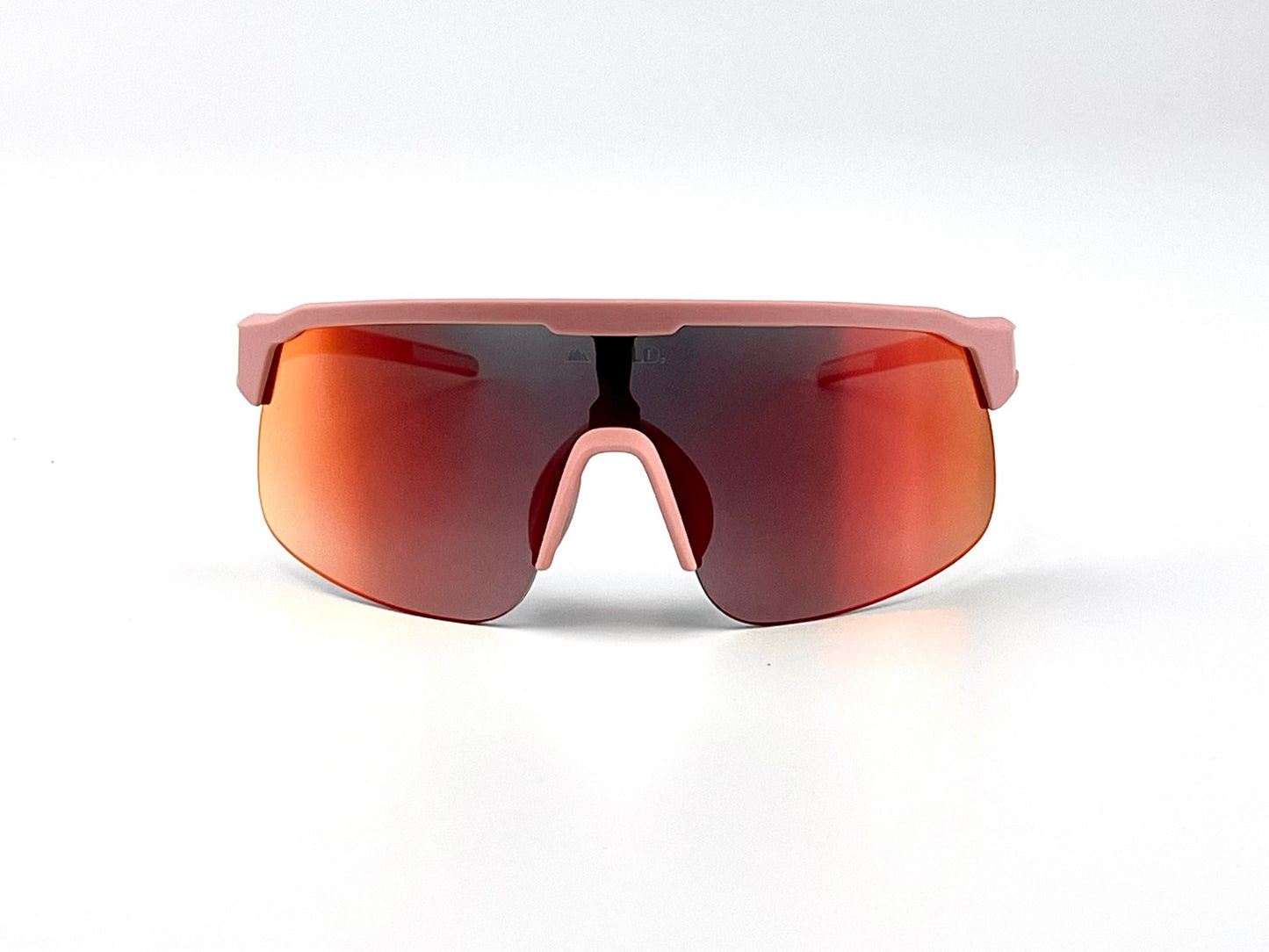 The BOLD Zippy Photochromic Sunglasses by boldouterwear feature a sporty, wraparound matte pink frame and a single red-orange mirrored lens, with an integrated bridge and nose pad, shown against a plain white background.