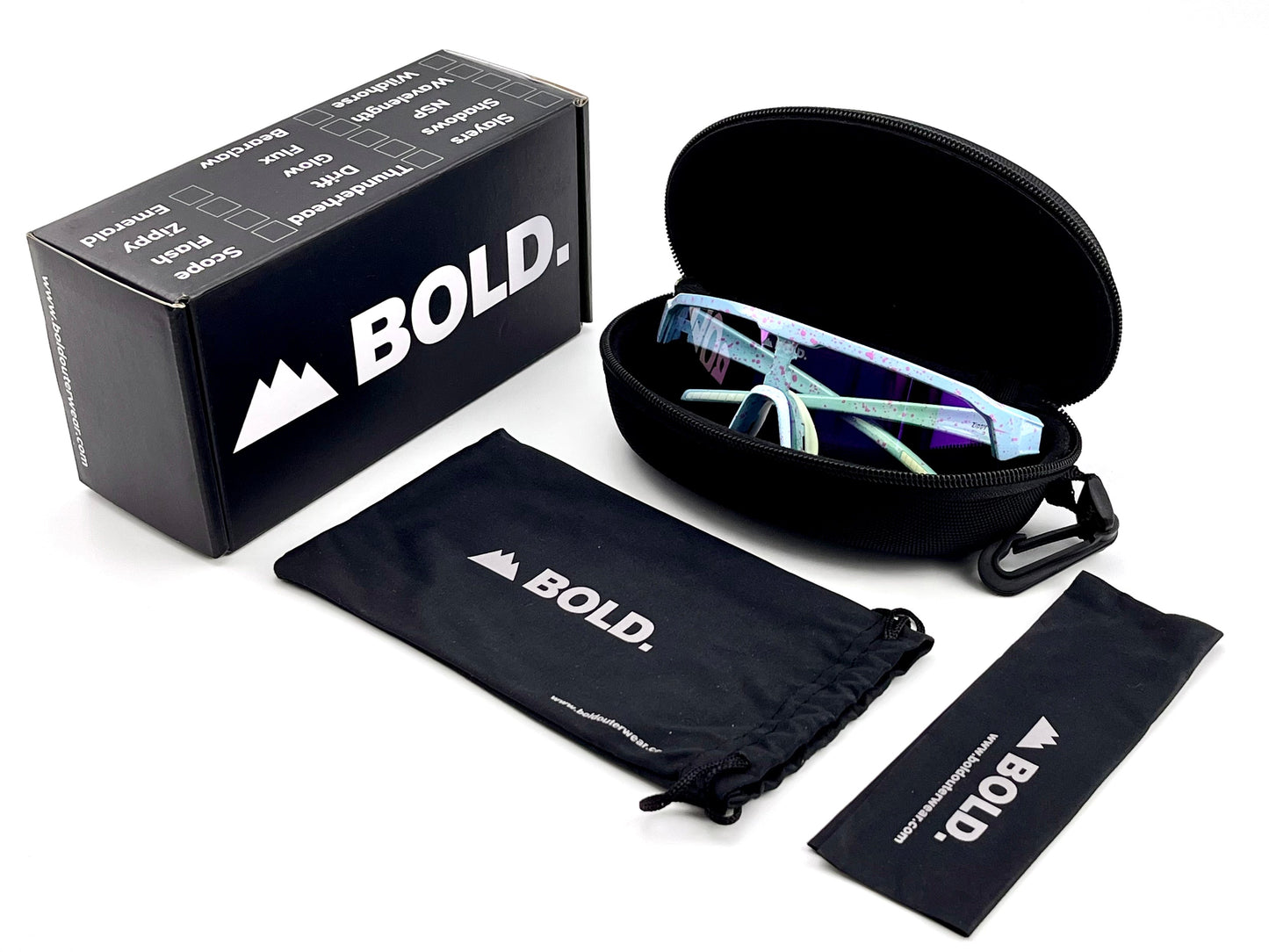 The BOLD Zippy Photochromic Sunglasses by boldouterwear are displayed on a white background with their black zippered case, branded box, drawstring pouch, and cleaning cloth.