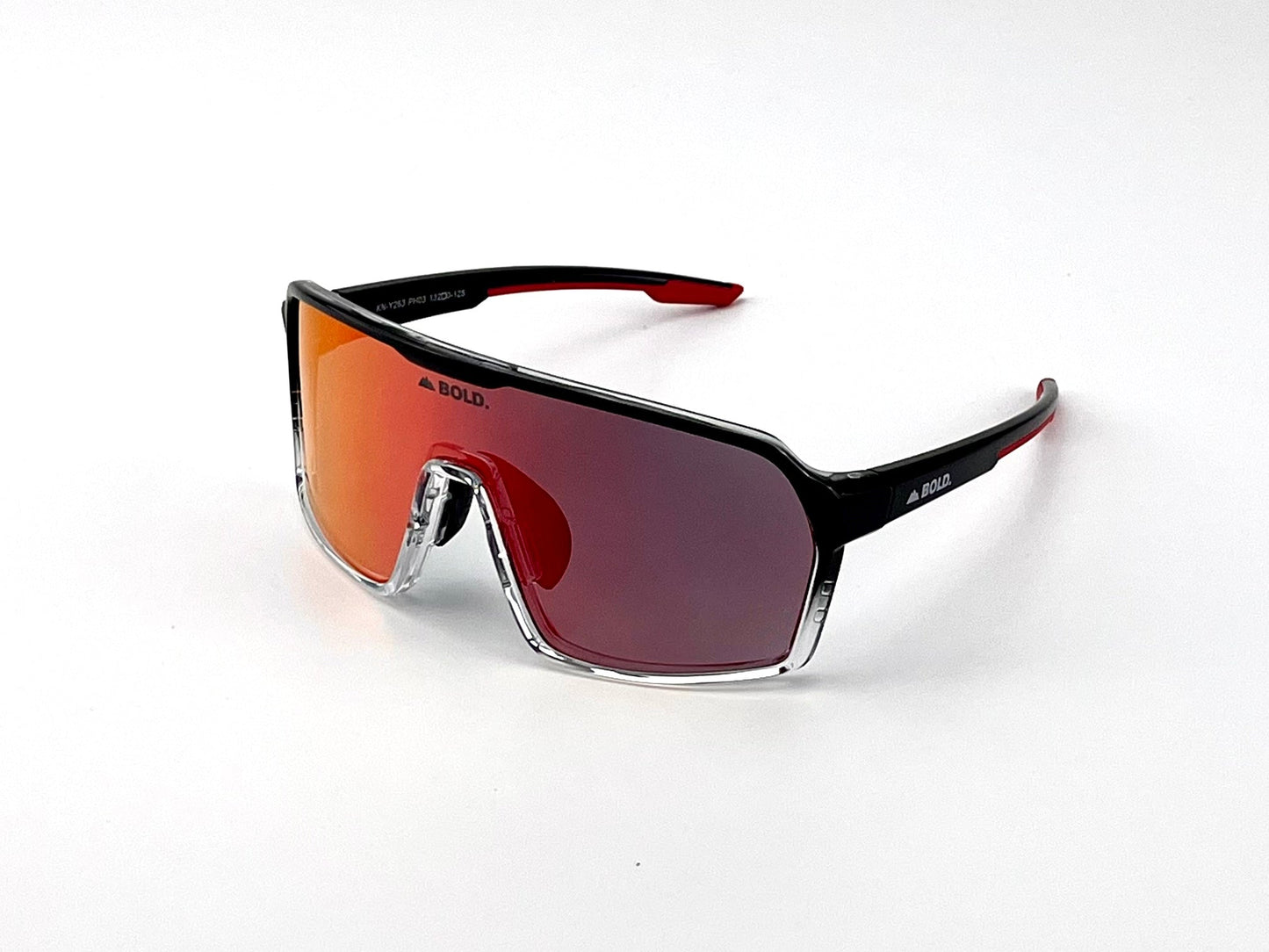 The BOLD Drift Photochromic Sunglasses by boldouterwear have a large, red-iridescent single lens, a black and transparent frame, and red temple tip details. The BOLD logo appears on the lens and arms against a plain white background.