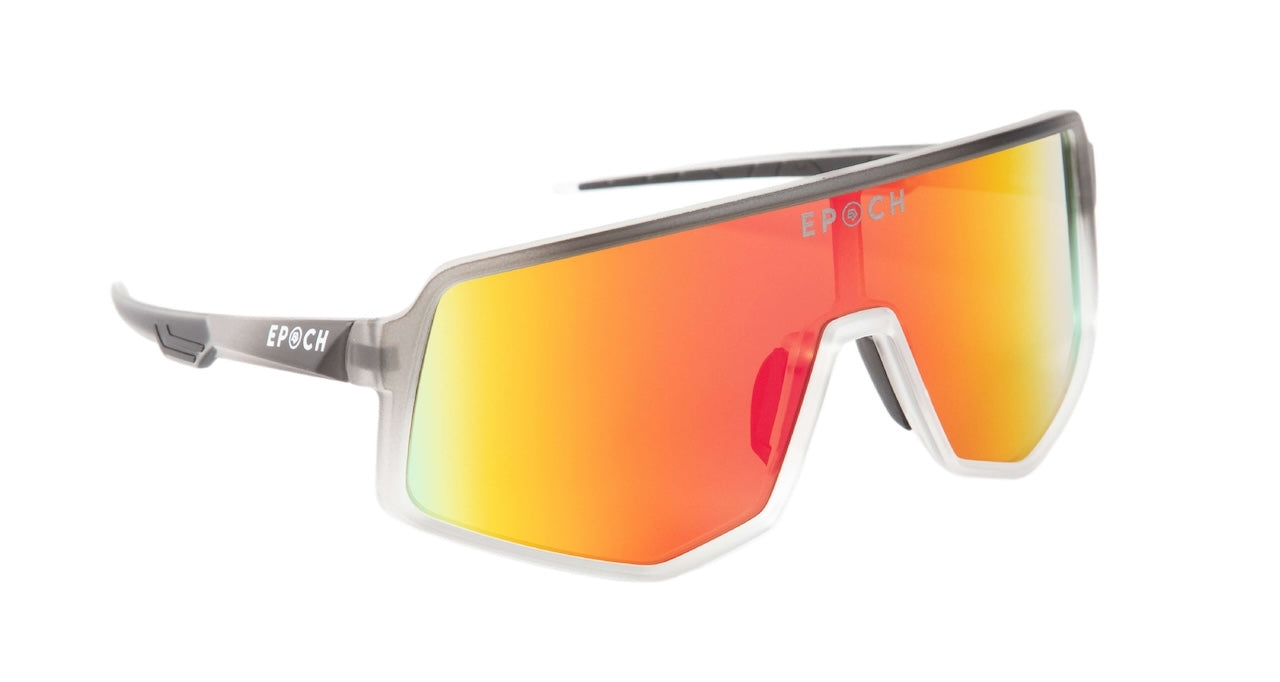 Epoch Eyewear’s L2 Sport Wrap Sunglasses feature a bold, modern design with a single orange-red mirrored lens and semi-rimless gray-white frame. “EPOCH” in white highlights their legendary style and lightweight, all-day comfort for everyone.