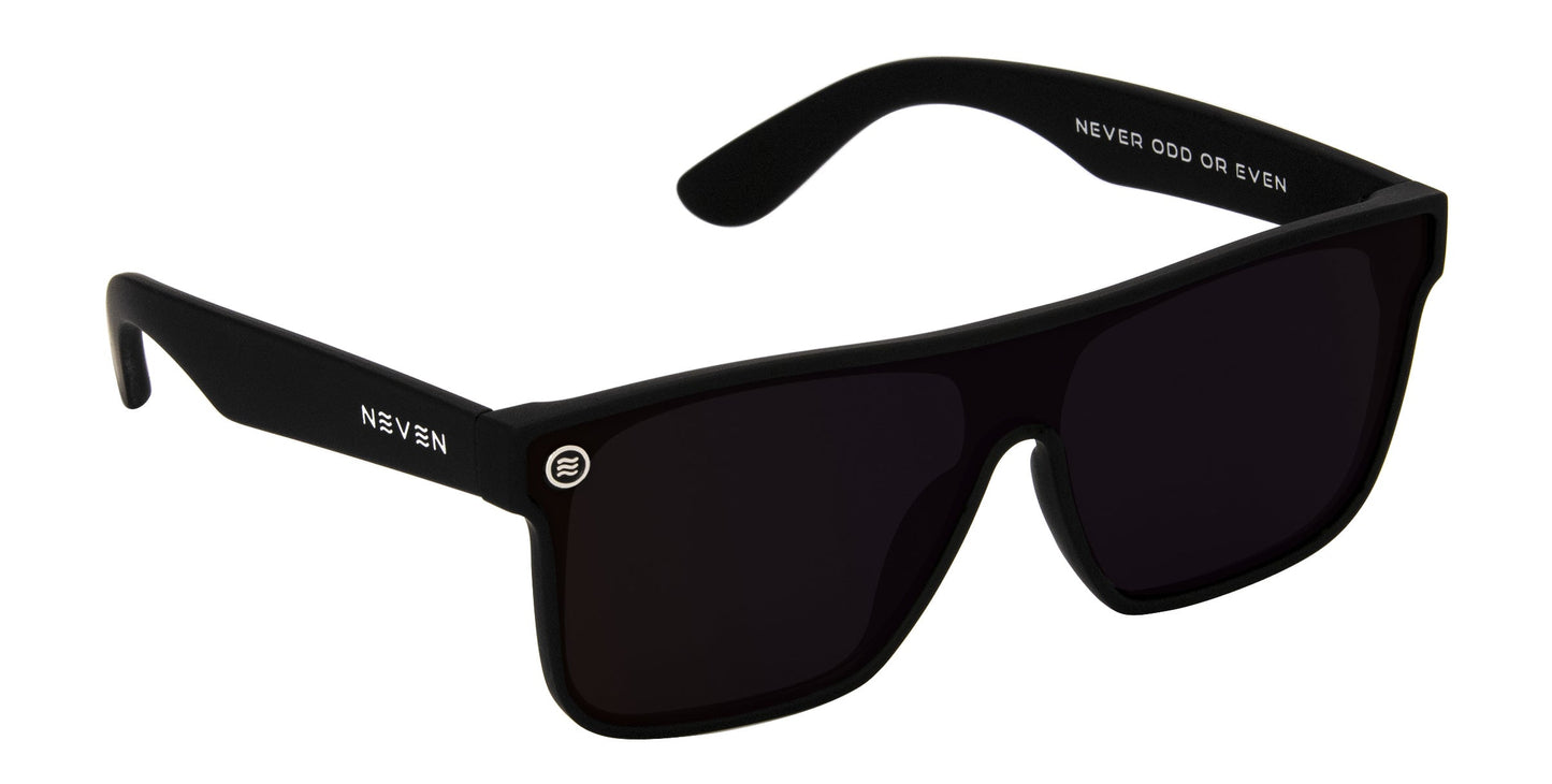 The Bold XL by Neven Eyewear are matte black rectangular oversized sunglasses with dark polarized lenses for UV protection. "NEVEN" is on the left temple in white, NEVER ODD OR EVEN on the inside right, and a small logo on the left lens.