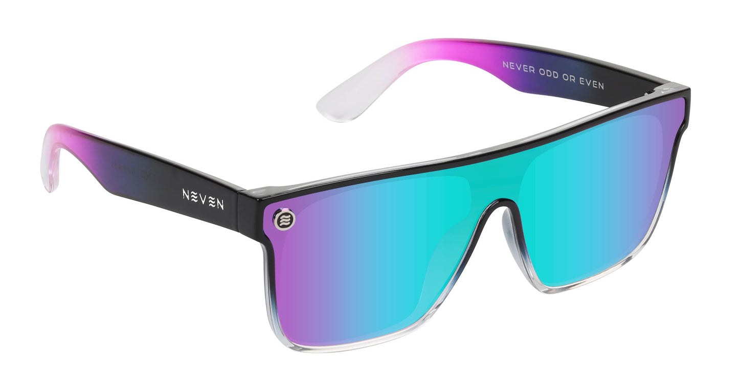 Nomads XL by Neven Eyewear are oversized shades with a single wide lens that fades from teal to purple. The black frame shifts to pink and white arms, with "NEVER ODD OR EVEN" inside the right arm for stylish UV protection anywhere.