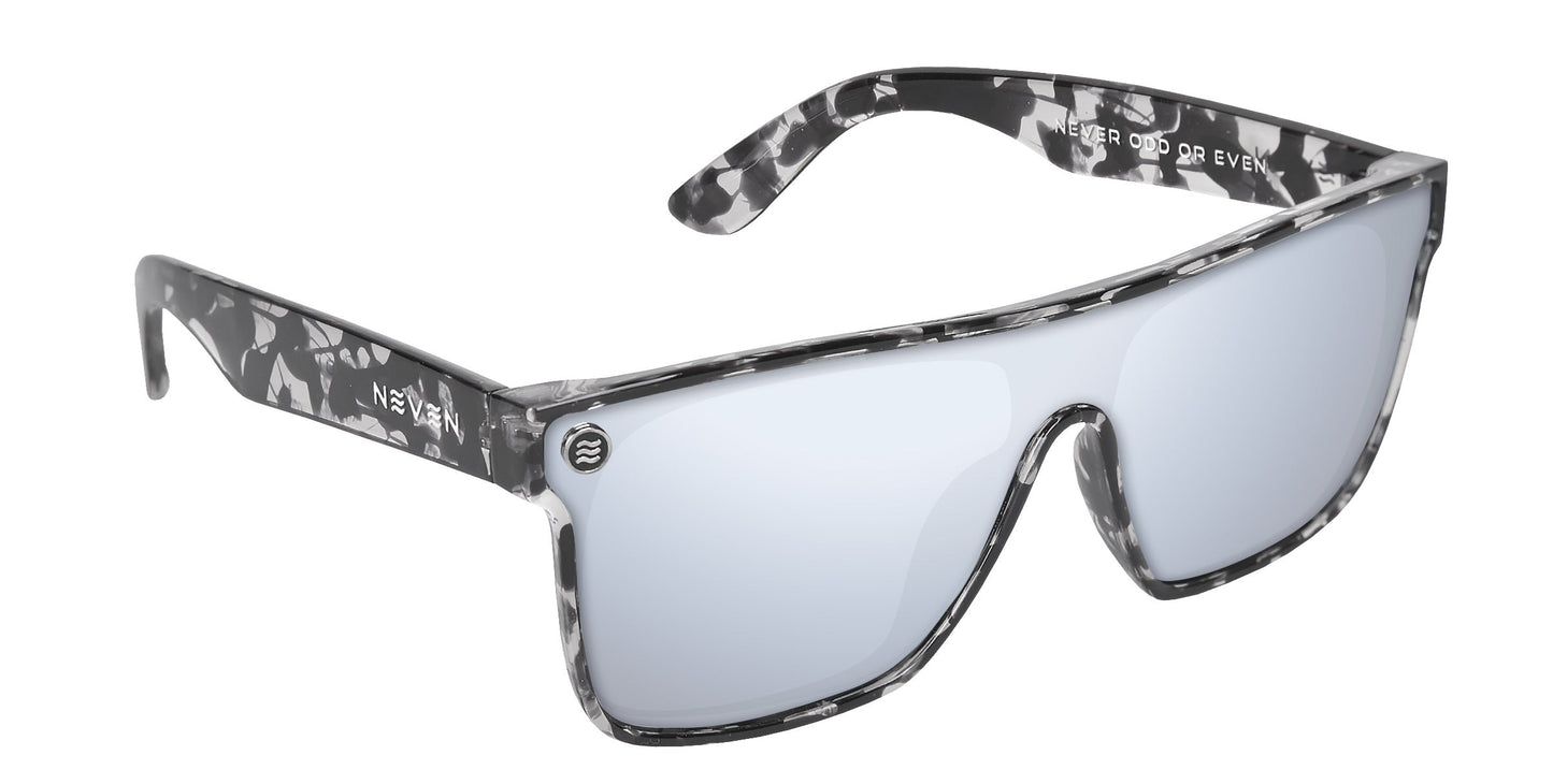 The Neven Eyewear Karma sunglasses feature a black, white, and gray marbled frame and a large mirrored lens with UV400 protection. “NEVER ODD OR EVEN” is printed inside the right arm; the left arm has a circular metal logo.