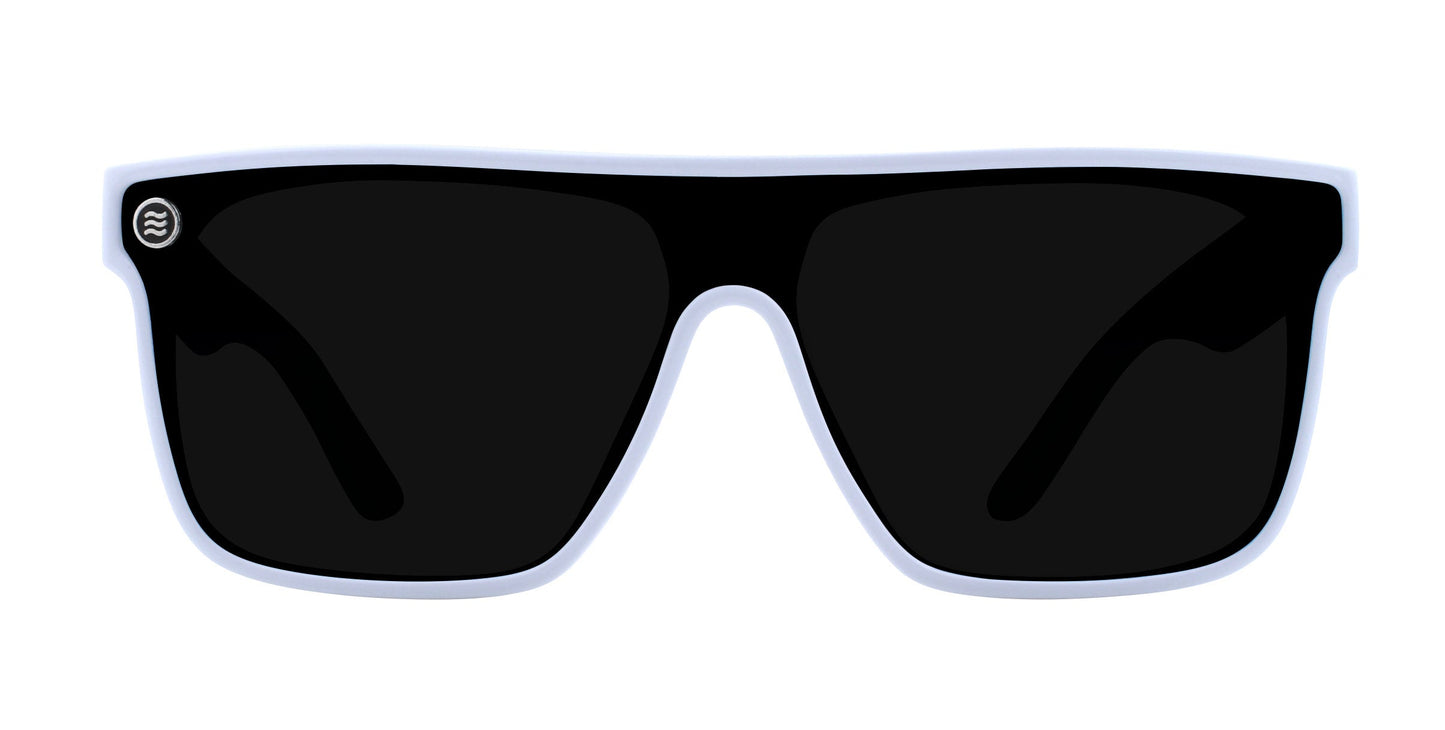 The Neven Eyewear Permafrost sunglasses feature black, rectangular minimalist frames with a white outline and thick design. Viewed from the front on a white background, they offer UV400 protection and have a small circular logo on the left lens.