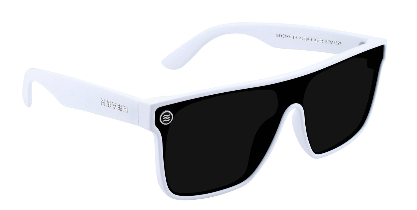 The Neven Eyewear Permafrost sunglasses feature a thick white plastic frame, large rectangular black UV400 lenses, straight curved arms, and a small circular logo on the top left lens for a stylish minimalist look.
