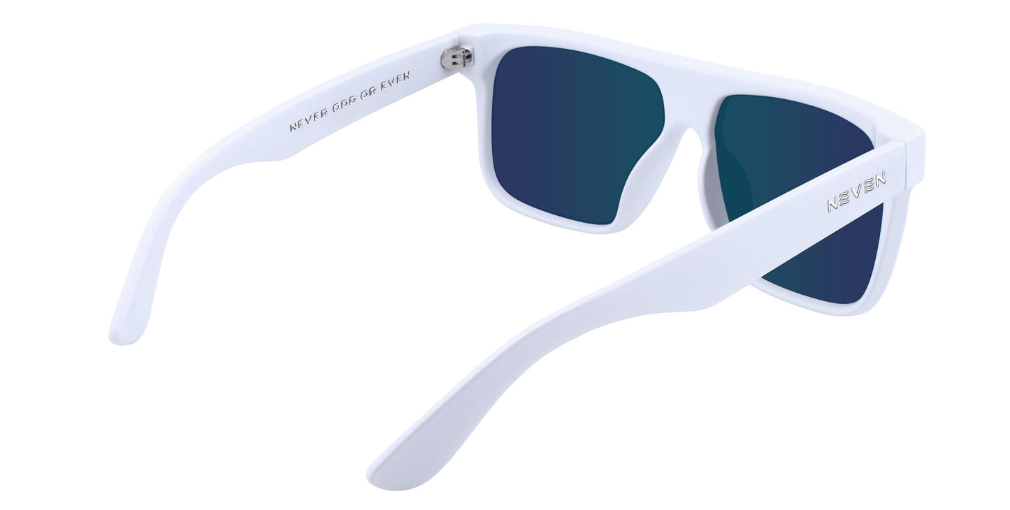 A pair of Muse sunglasses by Neven Eyewear with white frames and dark blue polarized lenses, shown from an angle behind and above. "KEVEN" in silver appears on one arm; small, angled writing is on the inner side of the other arm.