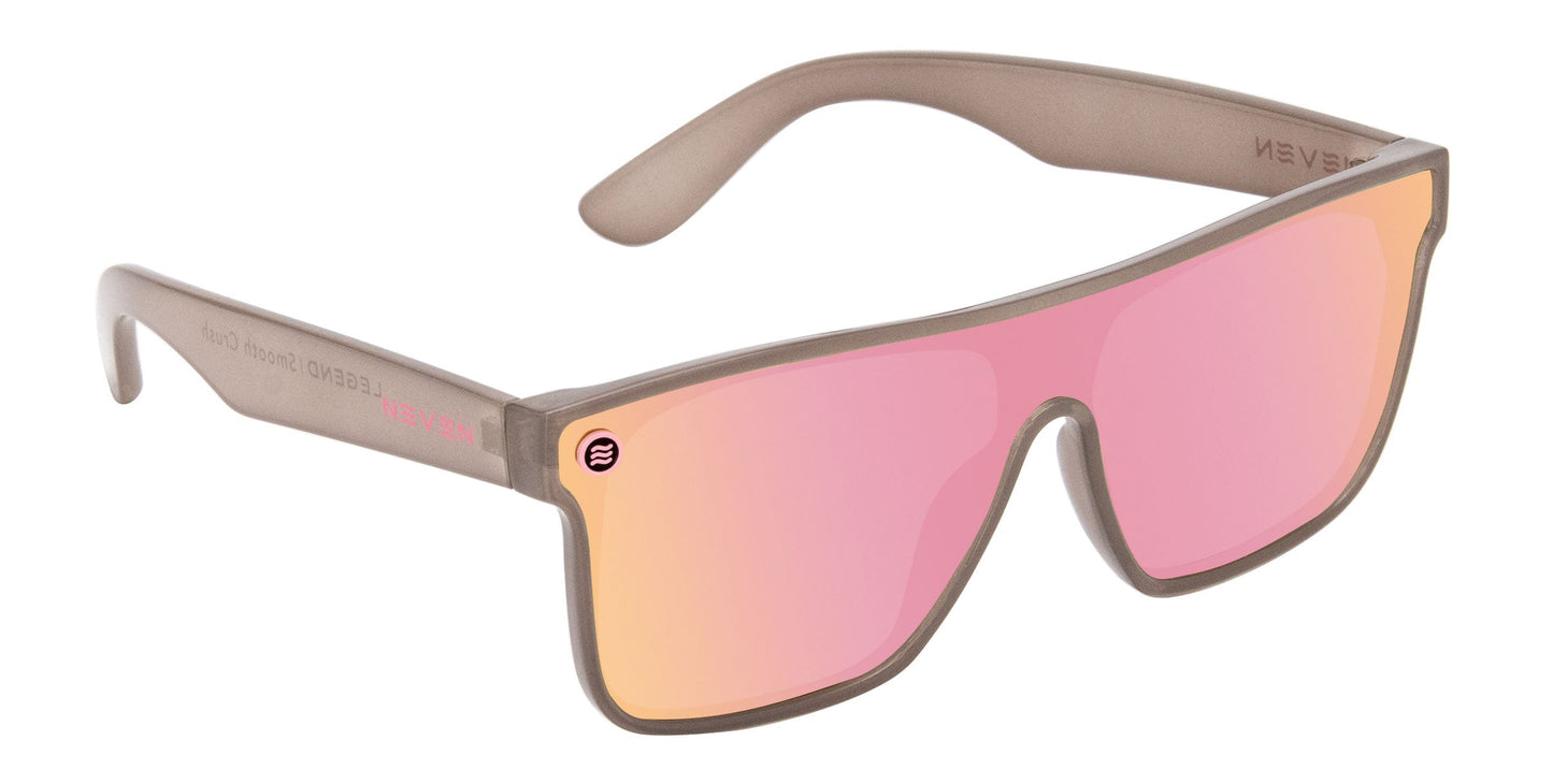 The Neven Eyewear Smooth Crush features a beige matte frame with wide arms, UV400 protection, and a single large pink-orange mirrored, impact-resistant lens. Pink polarized and finished with a black-and-white logo on the left lens.