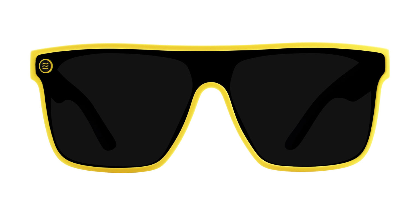 The Swarm by Neven Eyewear features large rectangular black polarized lenses, a striking yellow frame, and a small circular logo on the top left. These sunglasses offer UV400 protection and style against harmful rays. The background is plain white.