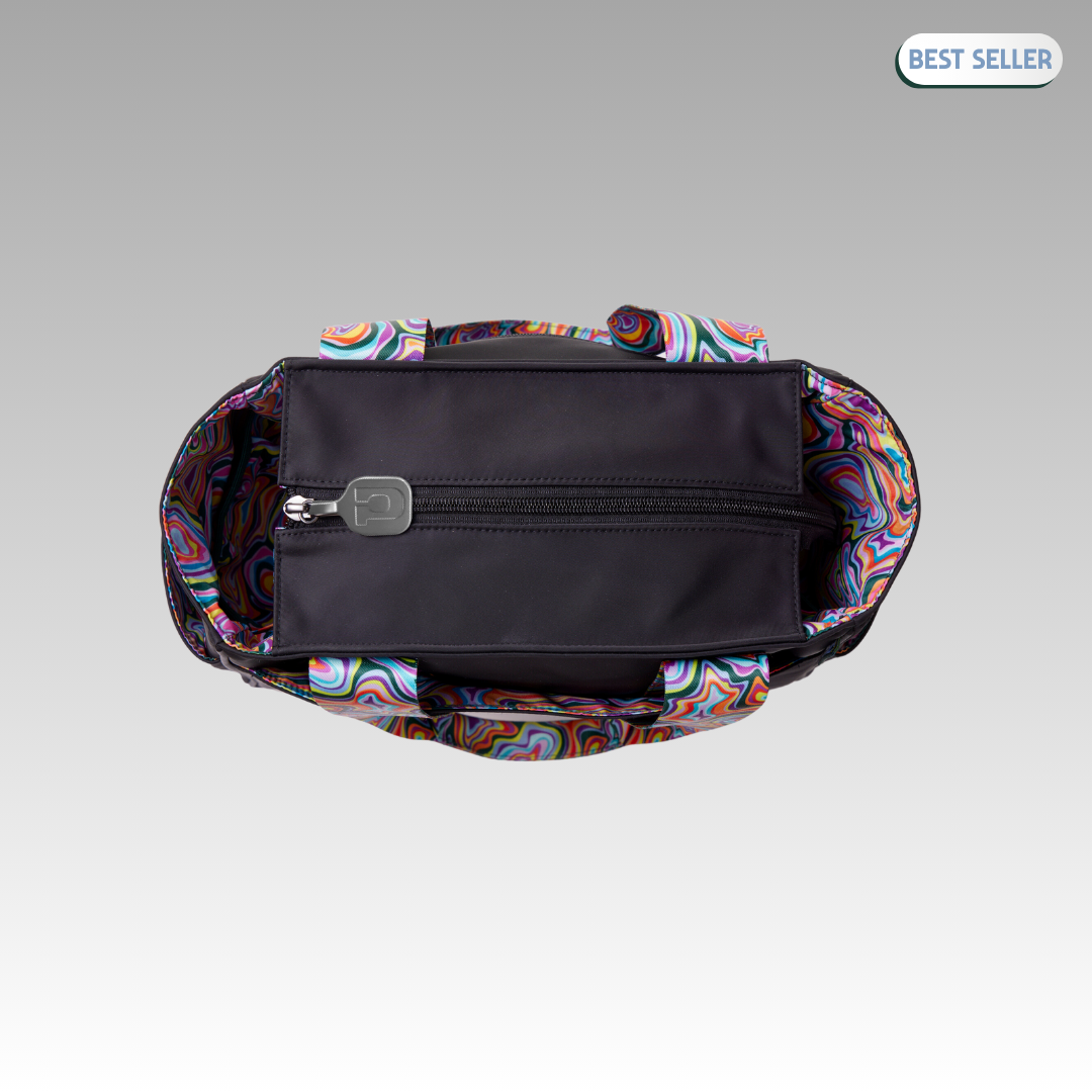 A top-down view of the Lulu Pickleball Tote by Playly Store shows its swirling multicolor pattern, black handles, and central zippered compartment. A "BEST SELLER" label appears at the top right on the gray background.