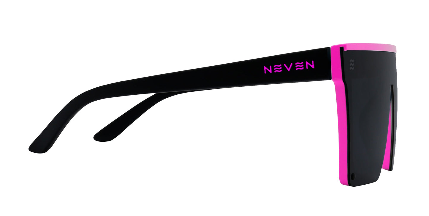 Neven Eyewear’s Never Enough sunglasses feature solid black polarized UV400 lenses set in bold black TR90 frames with bright pink edges and “NEVEN” printed in pink on the arm, offering a modern, standout look.