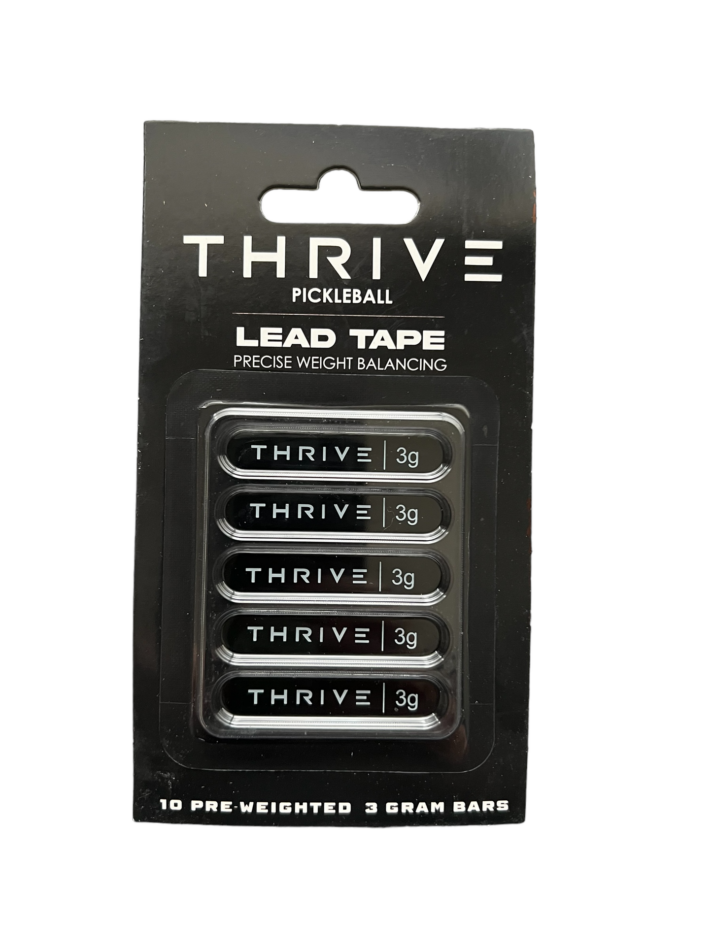 A black blister pack labeled “Thrive Pickleball Lead Tape” includes ten 3g bars marked “THRIVE 3g.” Easily customize your paddle’s weight with these pre-weighted strips from Thrive Pickleball.