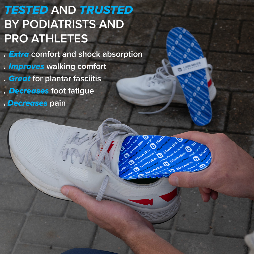 A person removes a blue Blumaka Recovery Bundle insole from a white sneaker on stone pavement. Text highlights extra comfort, shock absorption, pain relief, and support for plantar fasciitis. Another white sneaker is nearby.