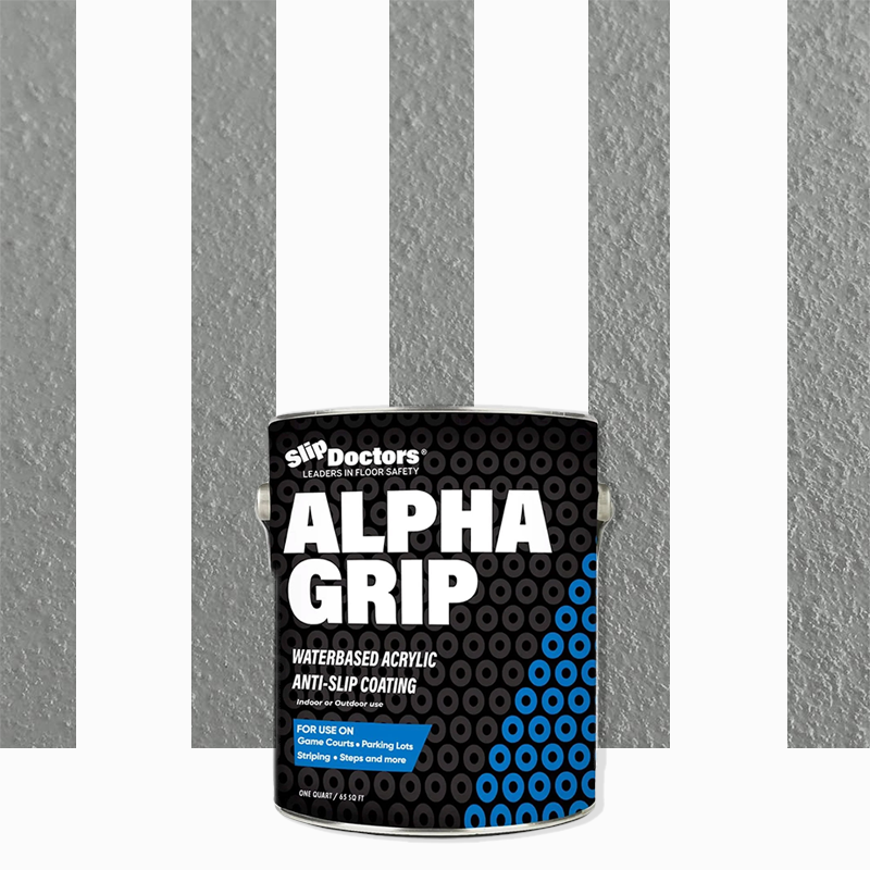 A can of SlipDoctors Alpha Grip Non-Slip Stripe and Athletic Court Paint sits in front of a textured gray surface with alternating light and dark stripes. The black can features blue accents, white text, and highlights its anti-slip coating benefits.