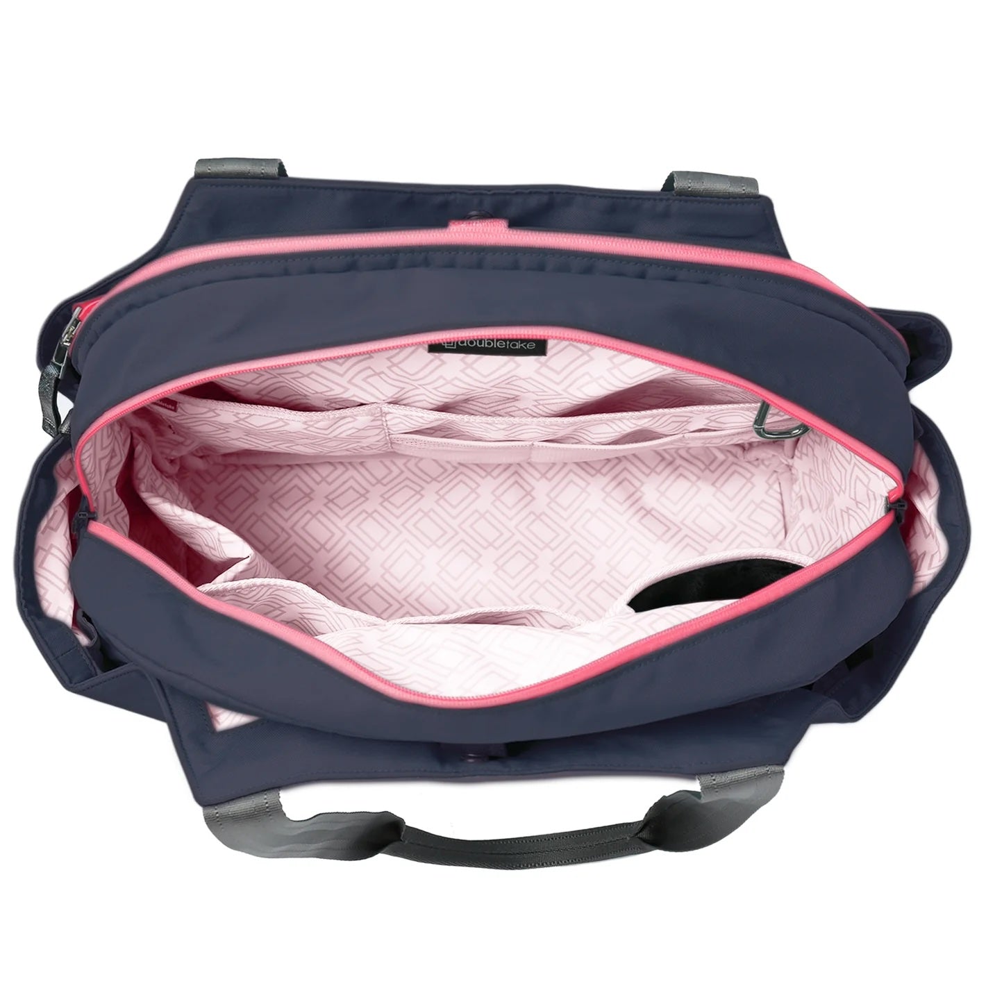 The Doubletake LONDON Pickleball Duffel & Tote in navy blue with gray handles features a spacious interior lined with light pink geometric fabric, multiple pink-edged compartments, and a small zippered pocket for organized storage.