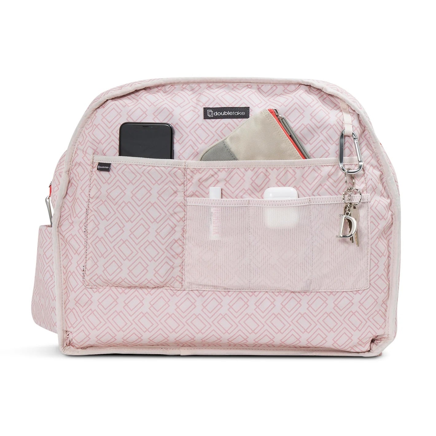 The Doubletake LONDON Pickleball Duffel & Tote features a pale pink geometric organizer insert with water-resistant material, multiple exterior pockets for your phone, cards, pens, AirPods, keychain, mesh sections, and a zippered main compartment.