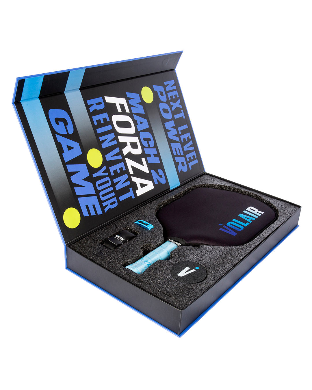A rectangular box with foam slots holds a Volair Pickleball Mach 2 Forza Pickleball Paddle in a black cover, a small blue bottle, and two accessories. The lid features "NEXT LEVEL POWER," "MACH 2 FORZA," and "REINVENT YOUR GAME" in bold.