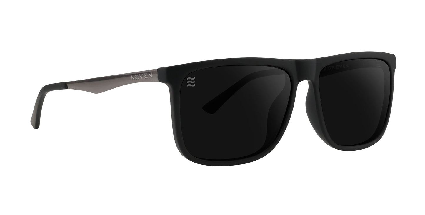 The Blueprint by Neven Eyewear are polarized sunglasses with rectangular black lenses, matte black frames, and dark gray temples with a metallic finish. “Neven Eyewear” appears on the left temple. Shown against a white background.