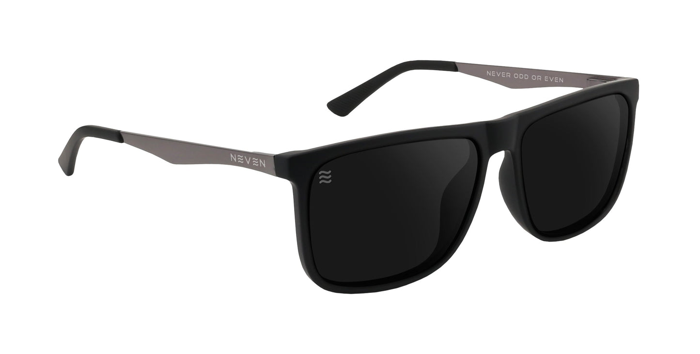 The Blueprint by Neven Eyewear are matte black rectangular polarized sunglasses with dark lenses, straight temples featuring "NEVEN" and a logo, plus the slogan “NEVER ODD OR EVEN” in white. Provides UV protection.