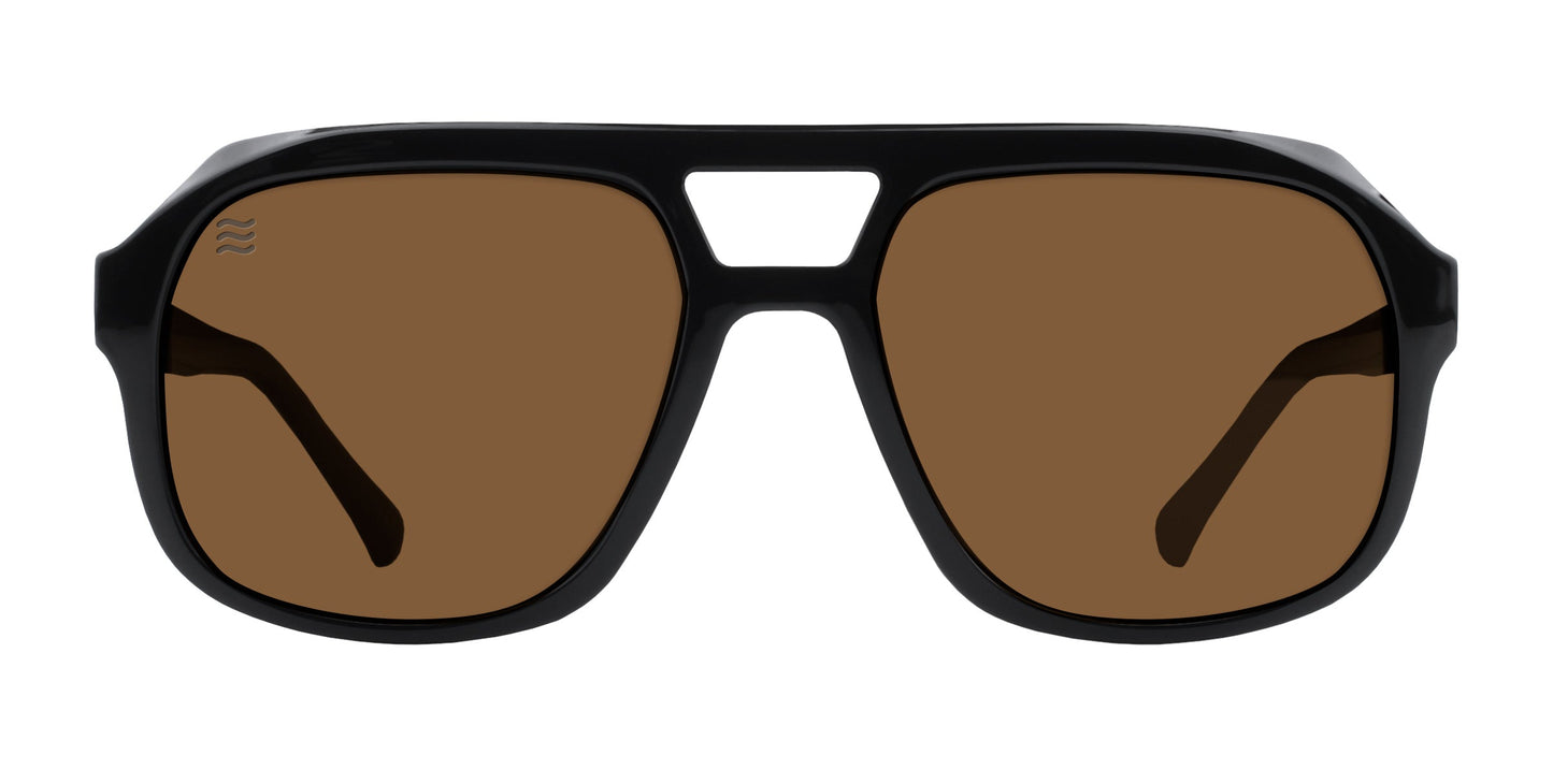 Gaia by Neven Eyewear: Retro aviator sunglasses with glossy black frames, large rectangular brown-tinted polarized UV400 lenses, thick double-bar bridge, bold wide temples, and a wavy logo on the top left lens.