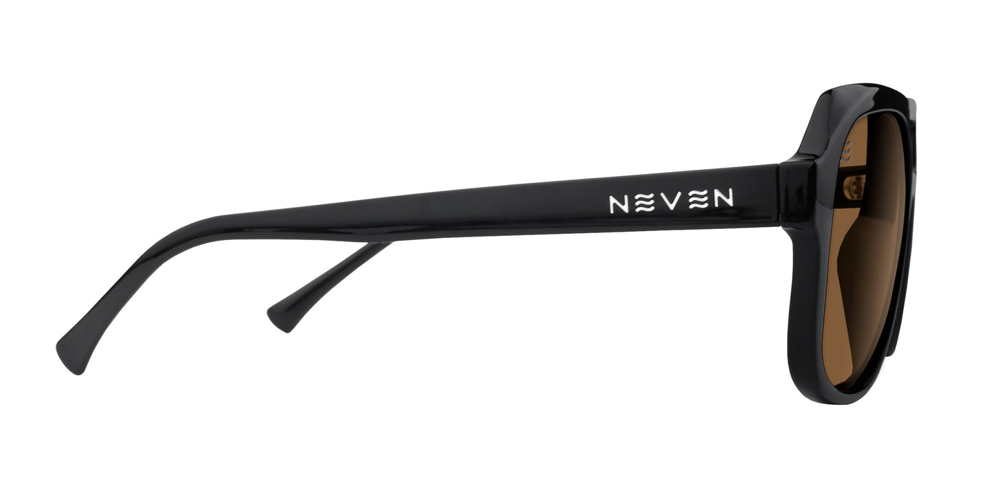 Side view of Neven Eyewear’s Gaia sunglasses featuring a black frame, brown polarized UV400 lenses, and thick glossy arms with bold "NEVEN" near the hinge. Modern, slightly oversized retro-aviator style for ultimate eye protection.