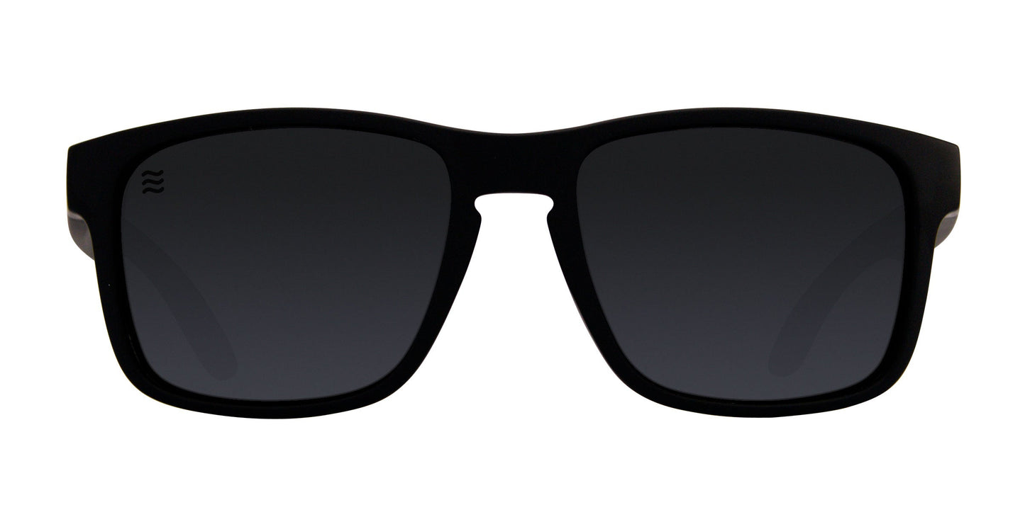 Neven Eyewear's 'Doom' sunglasses feature a bold, black rectangular frame with thick rims and dark, slightly reflective Polarized UV400 lenses. A small wave logo appears on the top left lens. Shown front-facing against a white background.