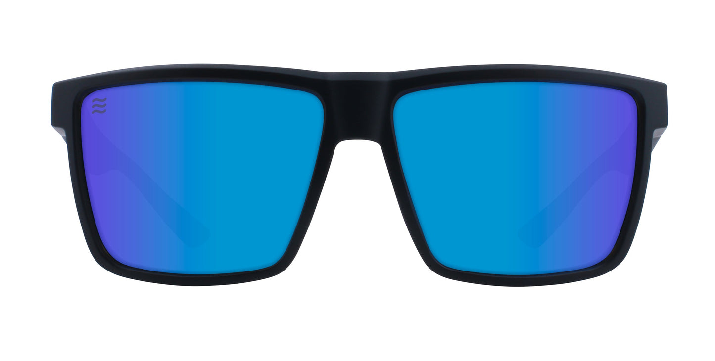 Front view of Neven Eyewear's Honest John's sunglasses with a thick, matte black rectangular frame and reflective blue polarized lenses featuring a subtle gradient and small wave logo on the left lens, set against a white background.