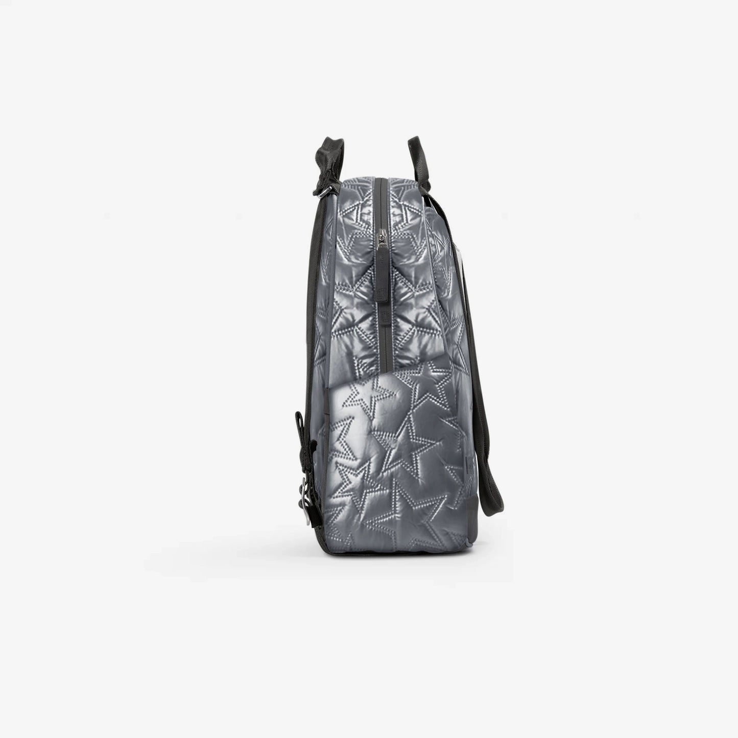 A side view of the silver Doubletake MELBIE | Pickleball Backpack & Tote, featuring embossed star patterns, black zipper, and black straps, displayed against a plain white background.
