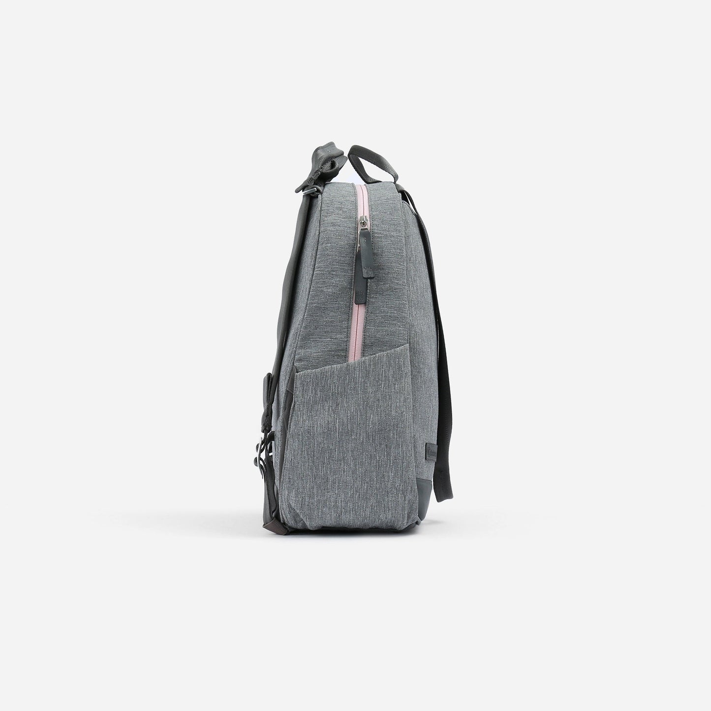 Side view of the MELBIE | Pickleball Backpack & Tote by Doubletake in gray with a subtle textured pattern, pink zipper, organized pockets, small front pocket, and two black shoulder straps. Stands upright against a plain white background.
