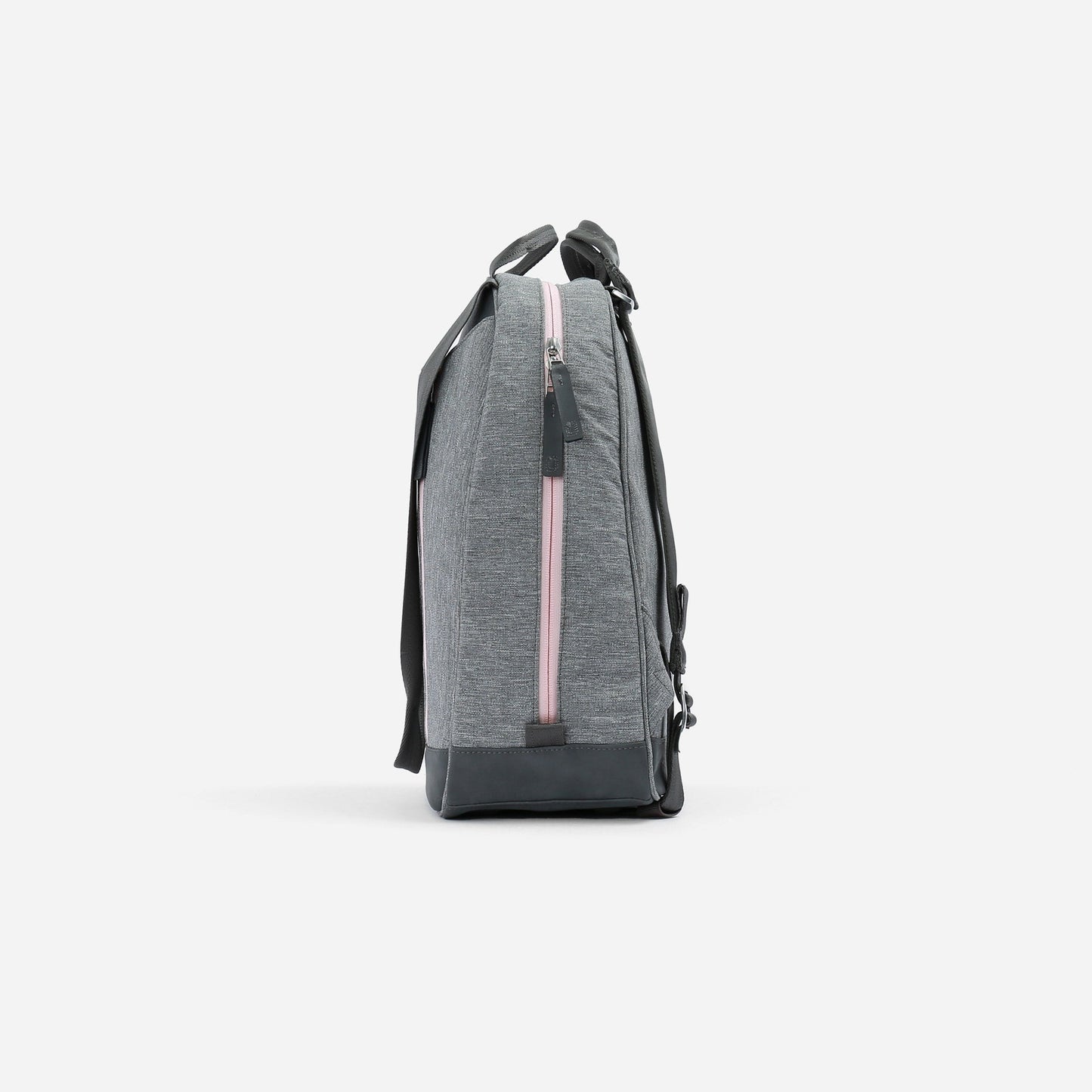 Side view of the Doubletake MELBIE | Pickleball Backpack & Tote in grey fabric with a pink zipper, black bottom panel, and straps. This modern, water-resistant bag has organized pockets and a minimalist design. Shown against a white background.