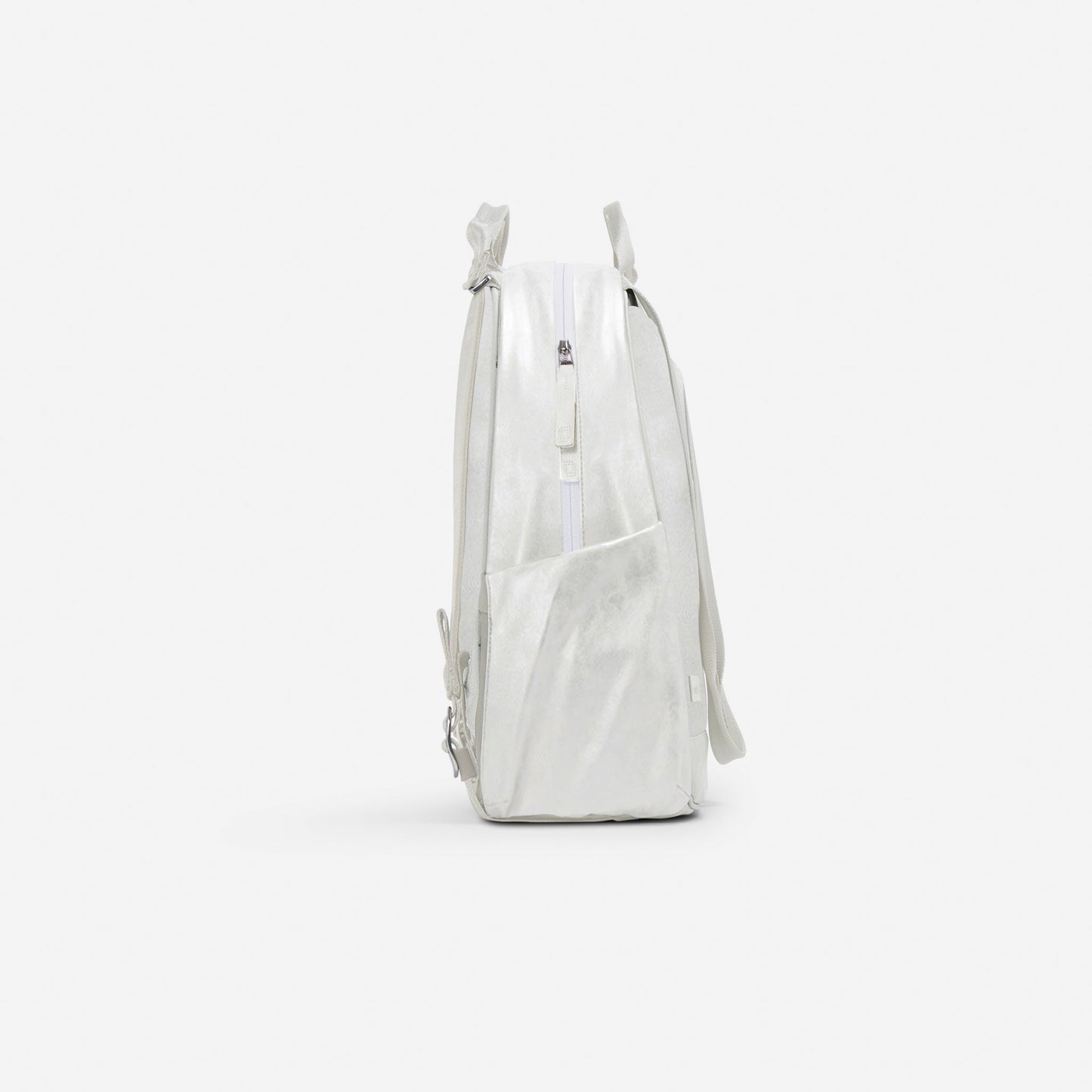 A side view of the MELBIE | Pickleball Backpack & Tote by Doubletake shows its sleek, modern white design with a top zipper pocket, side pouch, and adjustable shoulder strap. A plain background emphasizes its sophisticated look.